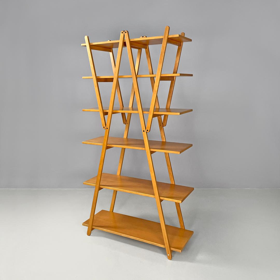 Italian modern wooden bookcase Nuvola Rossa Vico Magistretti for Cassina, 1980s
Bookcase mod. Nuvola Rossa entirely made of wood. The structure is composed of four diagonals with a square section that go from the ground and then join at the top to