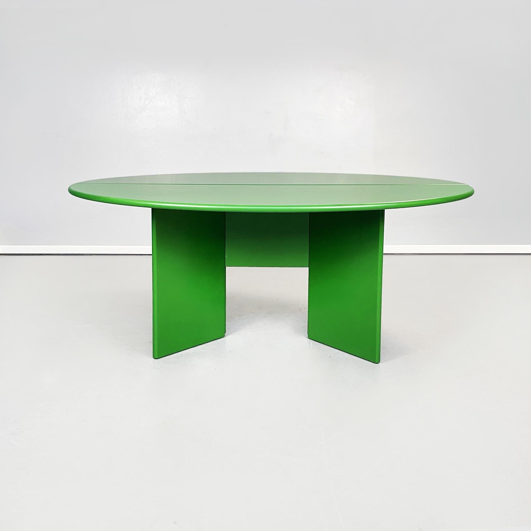 Italian modern wooden green table Antella by Takahama for Cassina, 1980s
Table mod. Antella with two semi-oval tops in green lacquered wood. The two tops are joined in the center by magnets and hinges, which allow the top to be folded. The