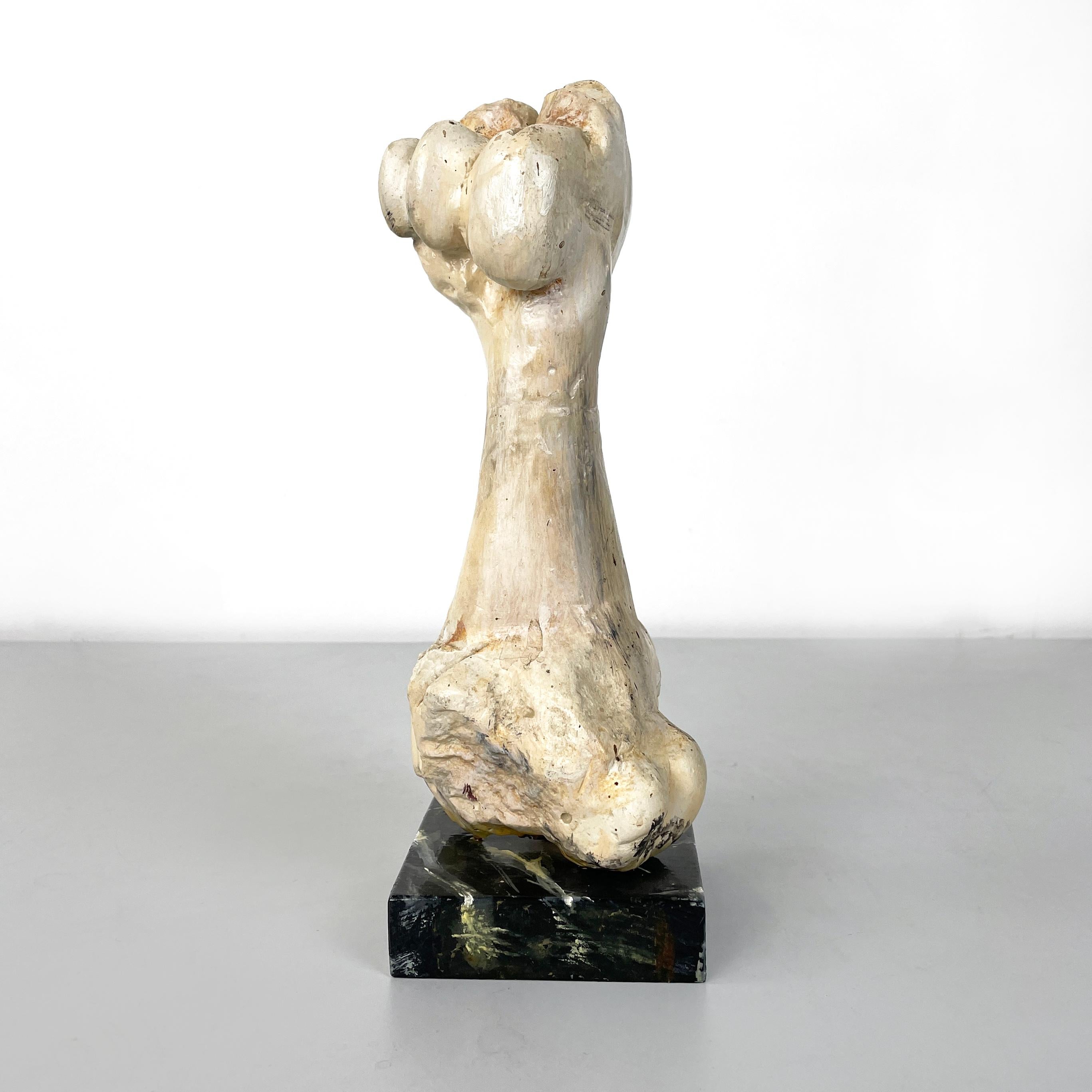 Italian modern Wooden sculpture of a bone by N.F. Puccio, 1990s
Sculpture entirely in painted wood. This object represents a short and thick bone, probably from an animal. The square base is made of wood painted in black and white to create a marble
