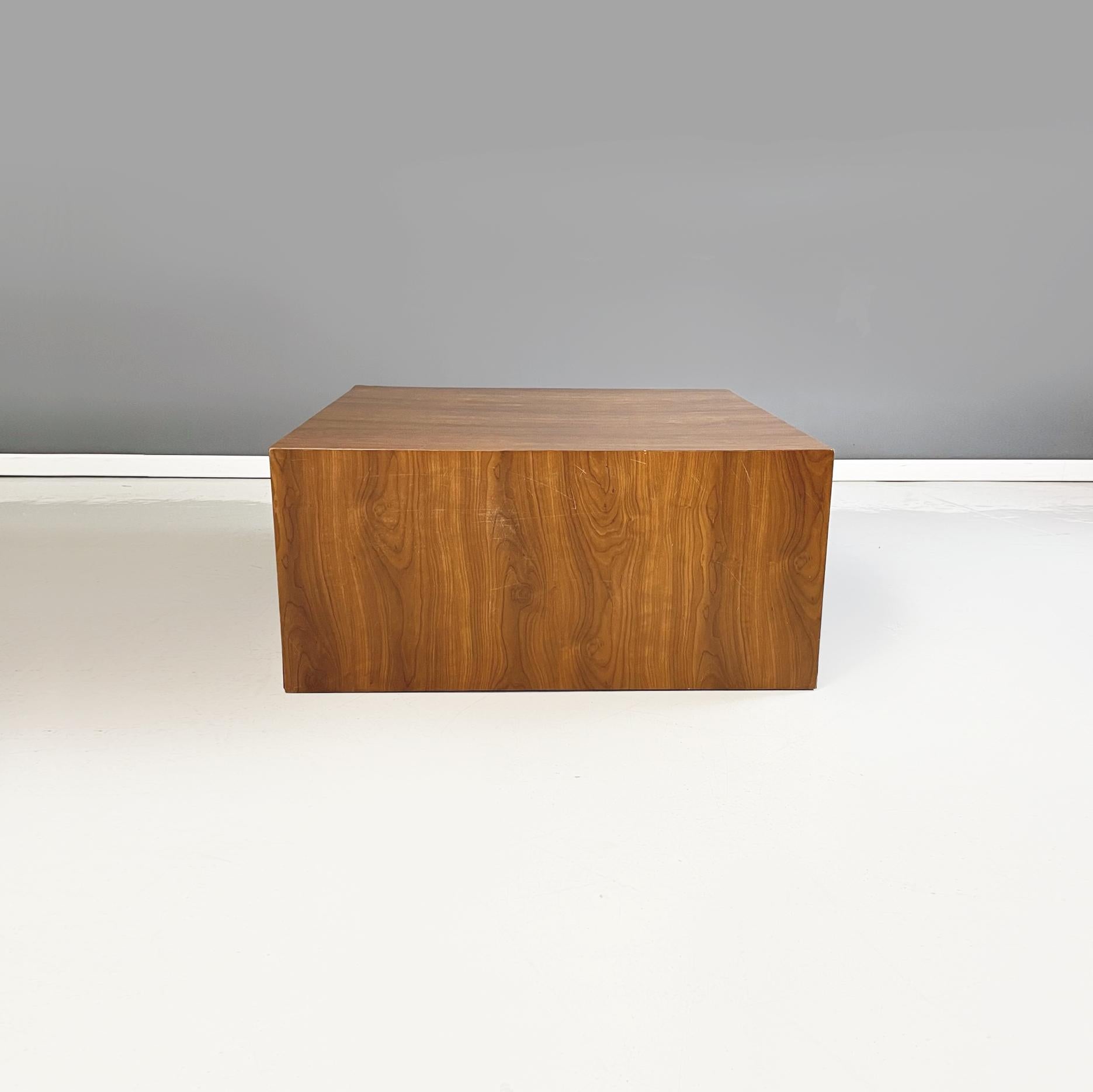 Italian modern Wooden square pedestal or stand display or coffe table, 1970s
Pedestal, display or coffee table, in the shape of a wooden parallelepiped. The entire structure is covered with its original walnut colored laminate.
1970s.
Vintage