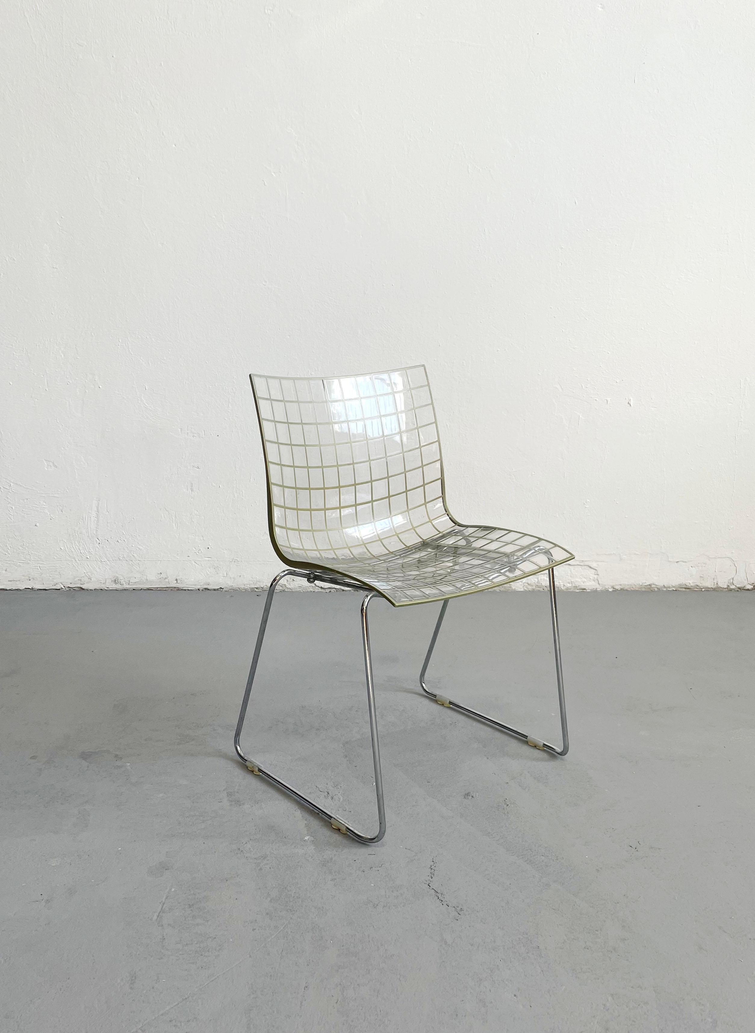 “X3” Chair with slide base, Italy 2000s.
Designer: Marco Maran
Signed

The single-piece transparent seat with a regular square mesh structure is obtained from the bi-injection of two materials, transparent polycarbonate, and mass-colored
