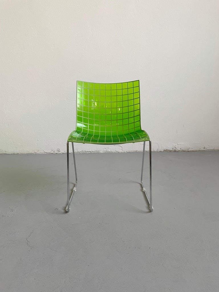 “X3” chair with slide base and a seat in neon green color, Italy 2000s.
Designer: Marco Maran
Marked 

The single-piece transparent seat with a regular square mesh structure is obtained from the bi-injection of two materials, transparent