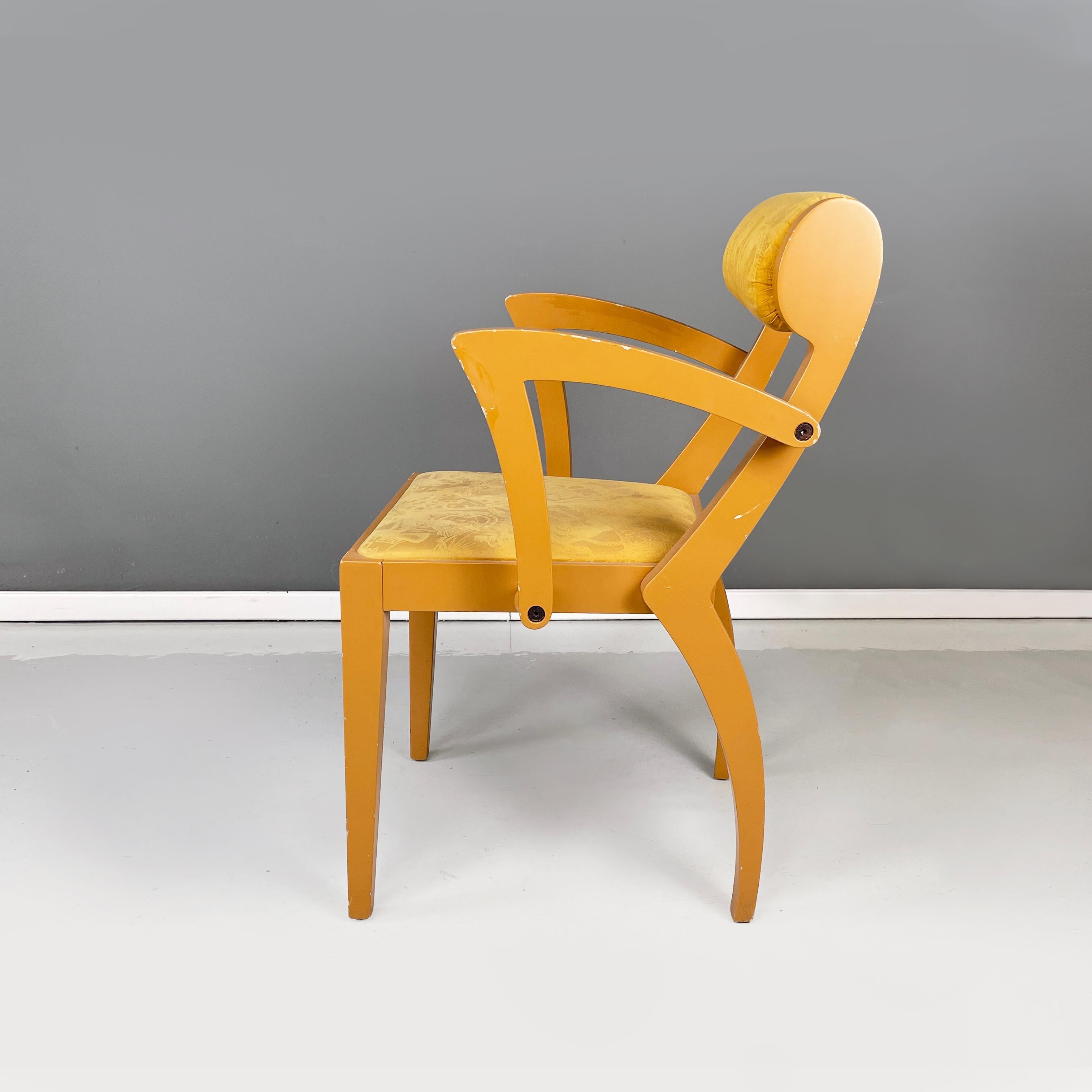 Italian modern yellow fabric and wooden chair by Bros/s, 1980s
Chair with yellow painted wooden structure. The padded backrest covered in worked yellow fabric is cylindrical in shape. The square seat is also padded and covered in yellow fabric.
