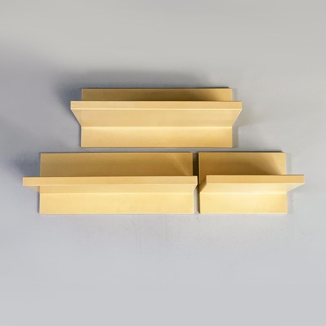 Italian modern set of three yellowed white plastic wall shelves by Marcello Siard for Kartell, 1970s
Set of three cream white plastic shelves designed by Marcello Siard for Kartell in the 70s, with asymmetrical profile and possibility of exposure in