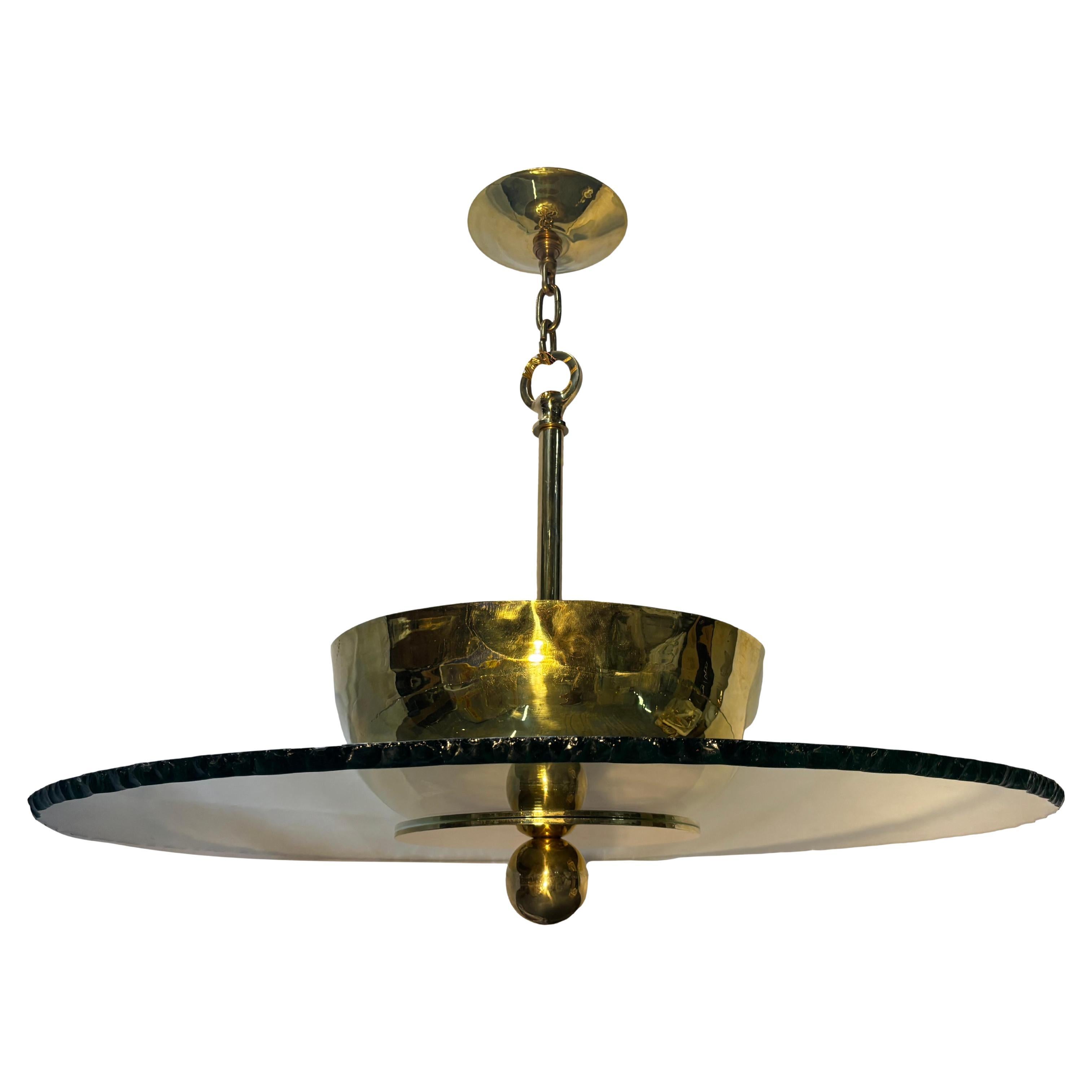 Luminaria italiana vintage de la década de 1960 con inserción de cristal artístico original y 8 luces interiores. El cristal tiene 2 pequeñas imperfecciones debidas a la edad, pero está completo.

Medidas:
Altura: 30
Diámetro: 41