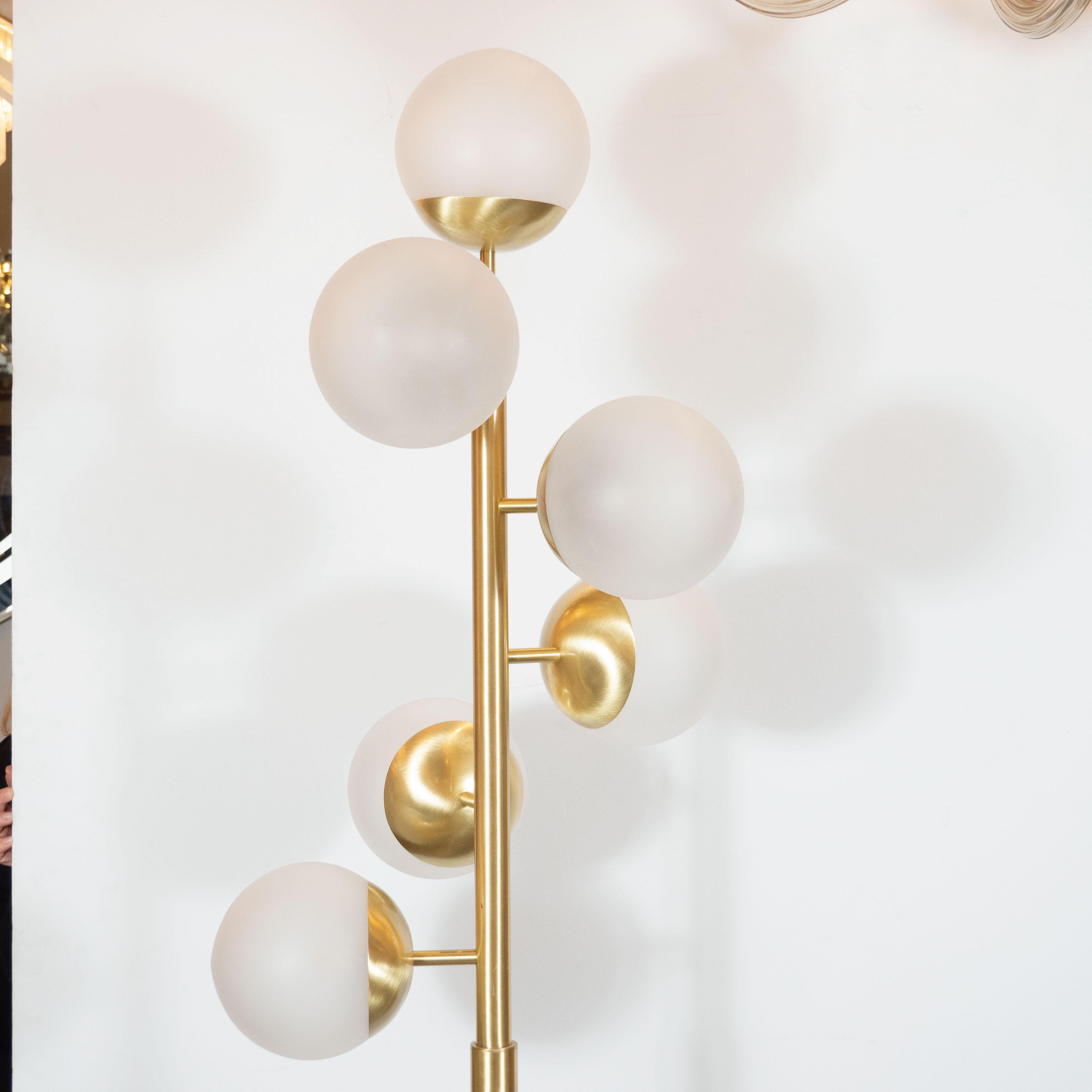 This refined floor lamp was realized in Murano, Italy- the island off the coast of Venice renowned for centuries for its superlative glass production- exclusively for high style deco. It features six frosted glass globes that attach to a cylindrical