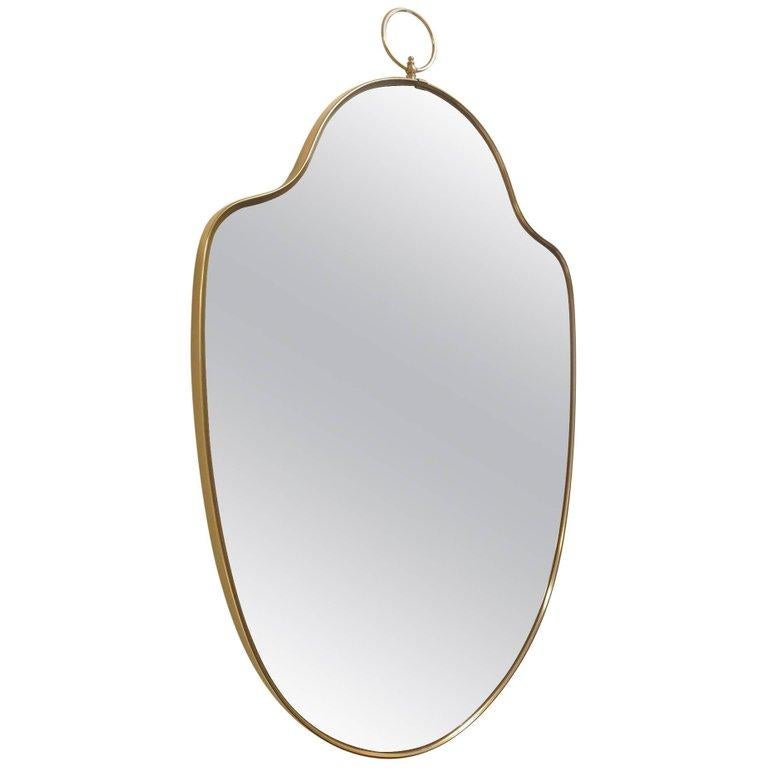 Italian Modernist Brass Mirror with a Decorative Ring at the Top In Good Condition For Sale In New York, NY