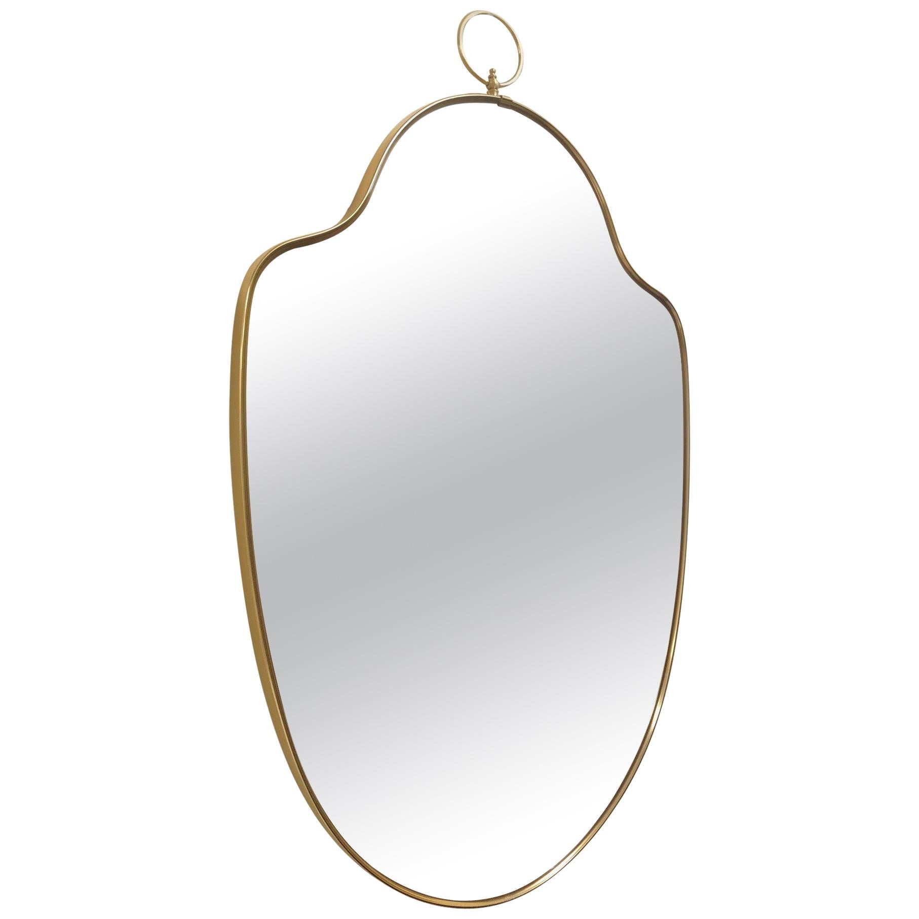 Italian Modernist Brass Mirror with a Decorative Ring at the Top For Sale