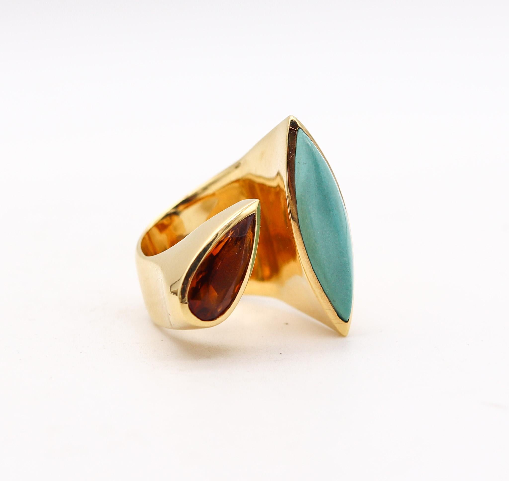 Sculptural double ring with diamond.

An sculptural bypass ring, created in Italy with modernist shapes. This beautiful ring was crafted in solid yellow gold of 18 karats with high polished finish. Mounted with natural earth mined gemstones, such; a