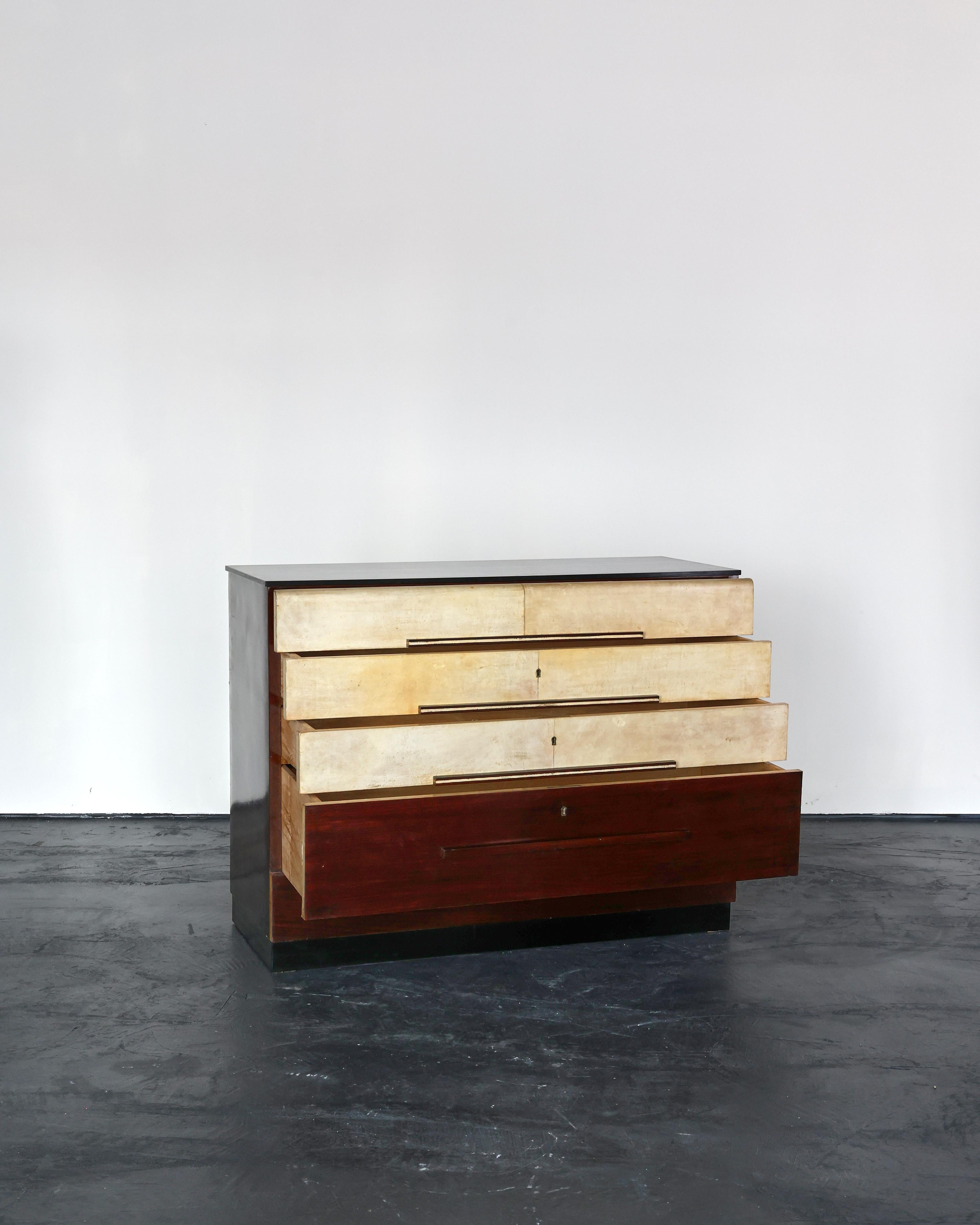 An exceptional C.1940s northern Italian parchment/vellum chest of drawers.

A total of four drawers with vellum detailing to three.

Nicely patinated with ebonised top.

W123 cm x D53 cm x H94 cm