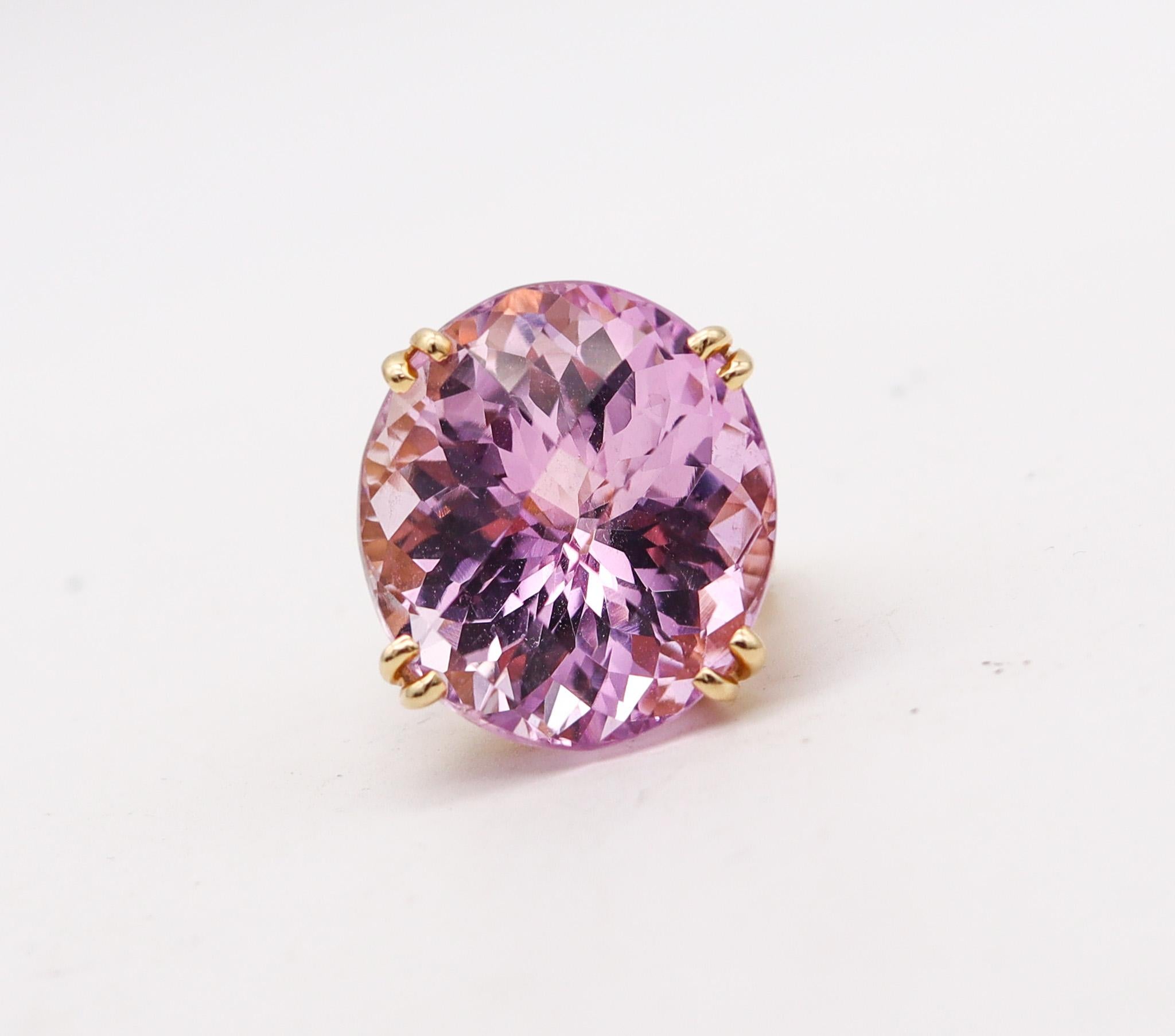 Modern cocktail ring with a large kunzite.

Gorgeous oversized modernist ring, crafted in Italy in solid yellow gold of 14 karats with high polished finish. This ring was designed as a solitaire with sleek contemporary patterns and the mounting was