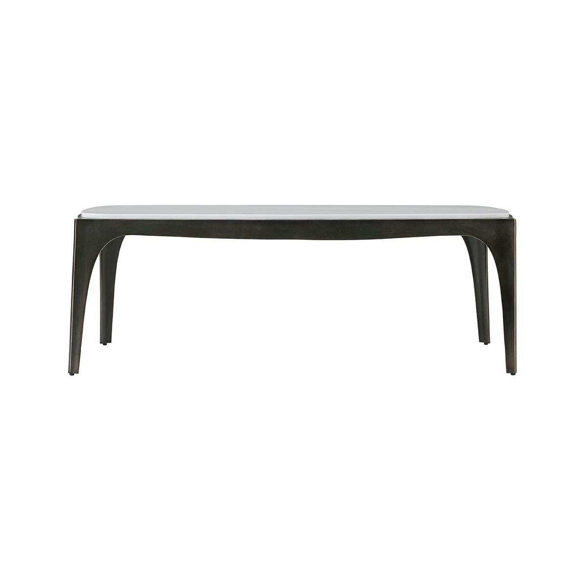 The raised marble top is set upon a shaped base with four organic sculptural legs, elegantly featured in a dark finished metal.

Dimensions: 49.25