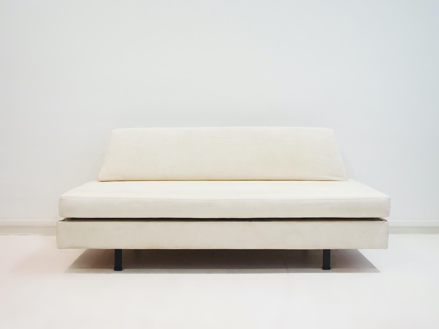 Minimalist sofa with clean lines that can easily be transformed into a bed. Manufactured in Italy in the 1960s by IPE. The structure of the sofa is made of iron, upholstery in soft white vintage fabric with removable cover. The backrest can be moved