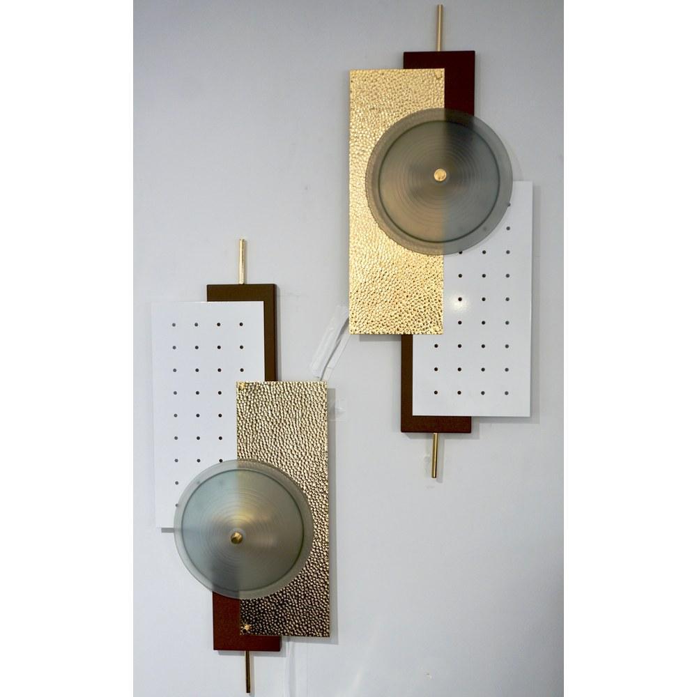 Contemporary pair of Italian wall lights inspired by the Memphis-style geometric shapes and differing colors. A very modern sleek design, with an accent on textures, consisting of offset rectangular metal shapes, one in perforated metal cold painted