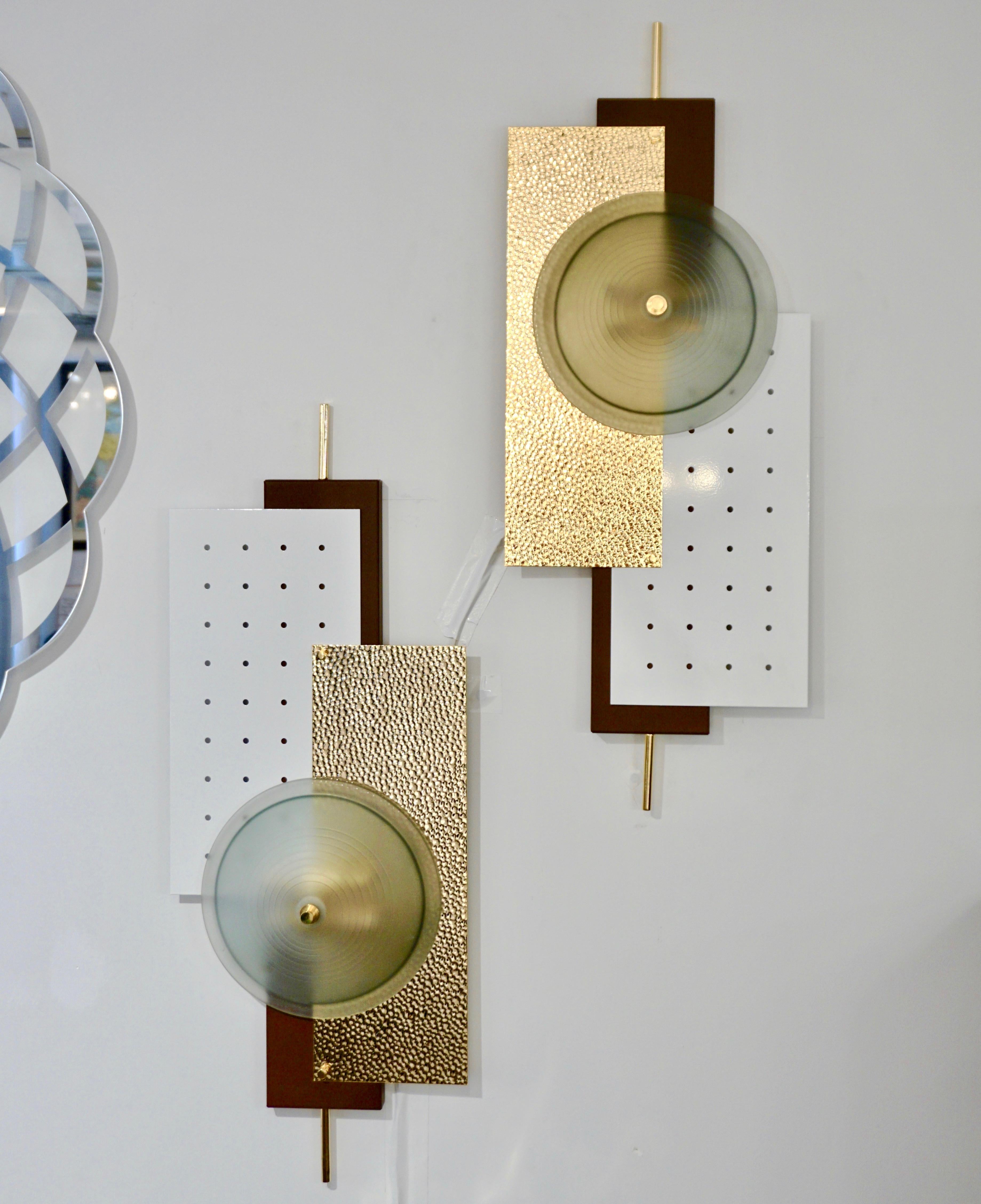 Contemporary pair of Italian wall lights inspired by the Memphis-style geometric shapes and differing colors. A very modern sleek design, with an accent on textures, consisting of offset rectangular metal shapes, one in perforated metal cold painted