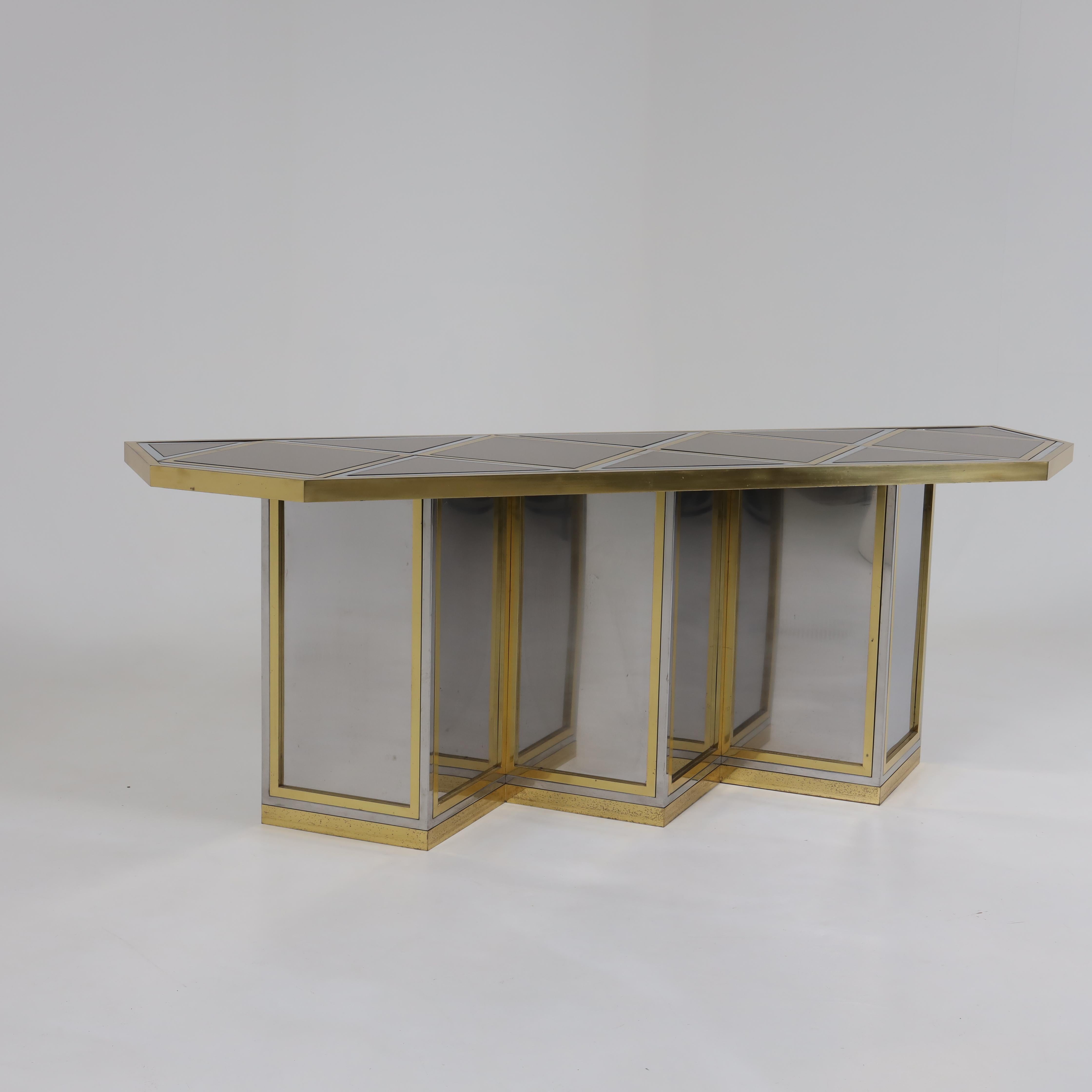 Italian Modernist console table attributed to Sandro Petti. 
Patinated brass, chrome and mirrored glass laid out in a diamond.
shaped geometric pattern across the top.