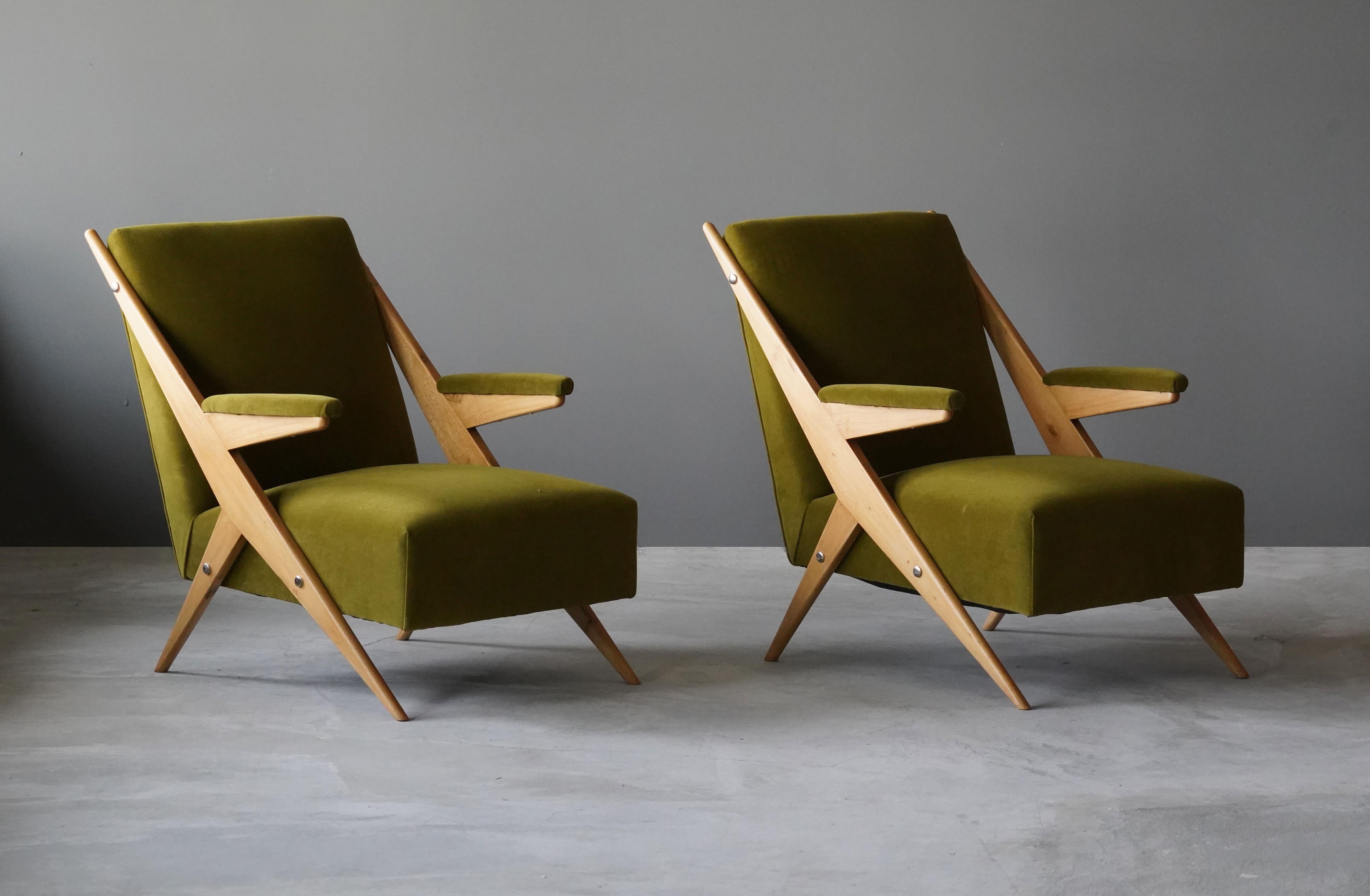A set of highly modernist lounge chairs / armchairs. Designed and produced in Italy, 1960s. Reupholstered in a brand new high-end fabric. 

Other designers of the period include Franco Albini, Gio Ponti, Zanine Caldas, Ico Parisi, Osvaldo Borsani,