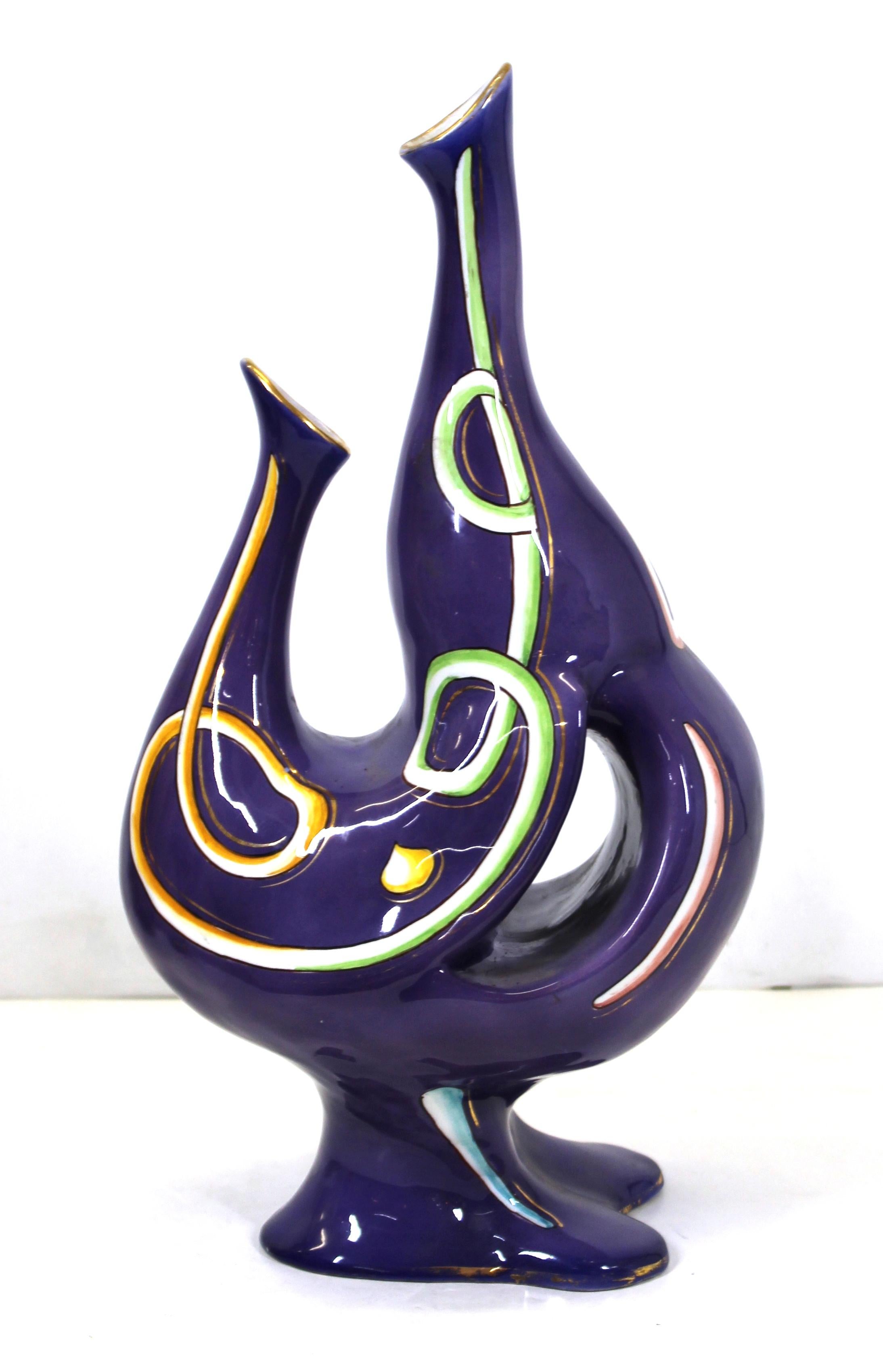 Italian modernist whimsical glazed ceramic anthropomorphic vase with hand painted gold detailing. The piece has an aubergine-purple color and was made in Italy during the 1940s-1950s. Old illegible label on the bottom. In great vintage condition