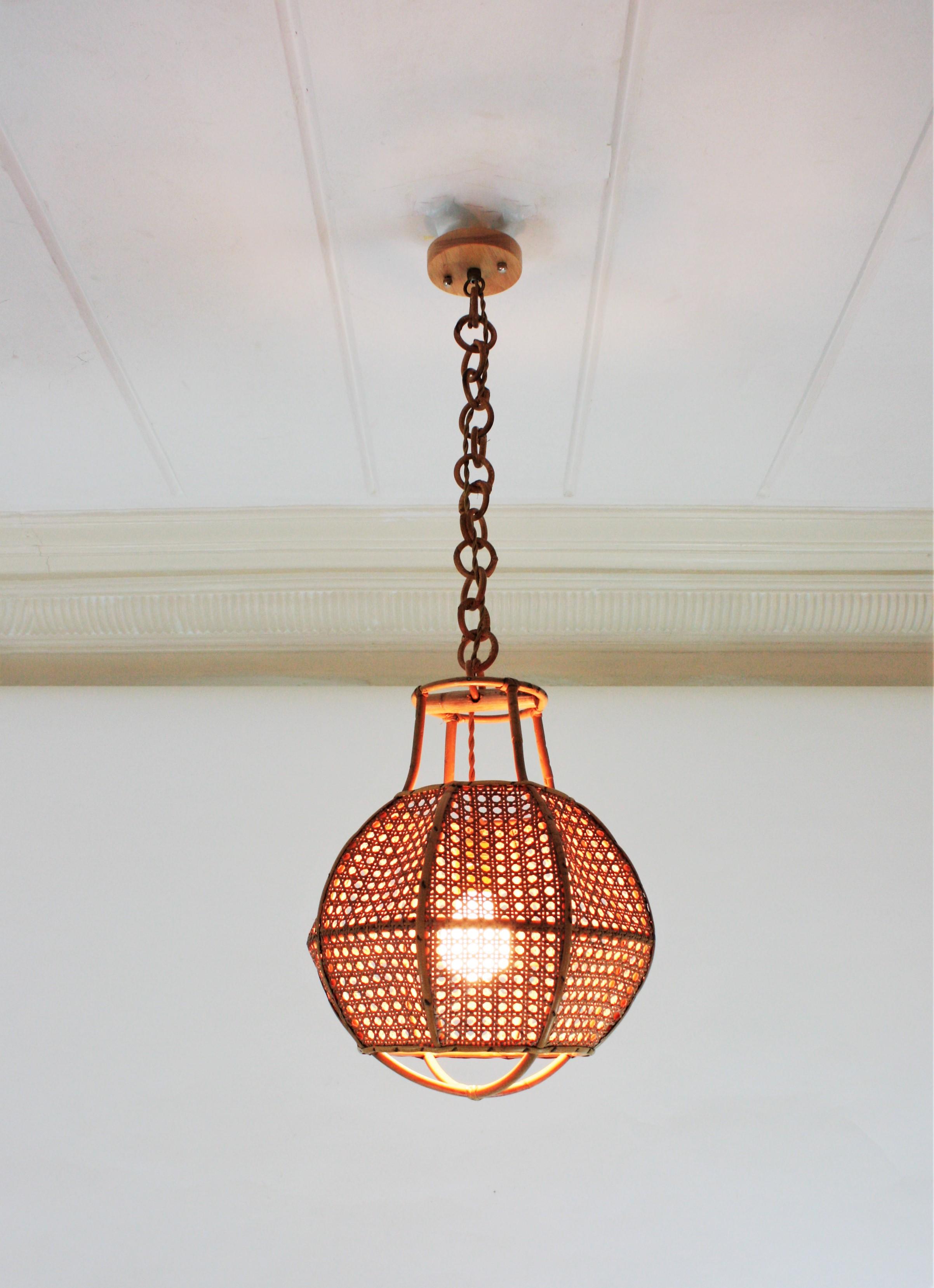 Cane Italian Modernist Wicker Wire and Rattan Globe Pendant / Hanging Light, 1950s