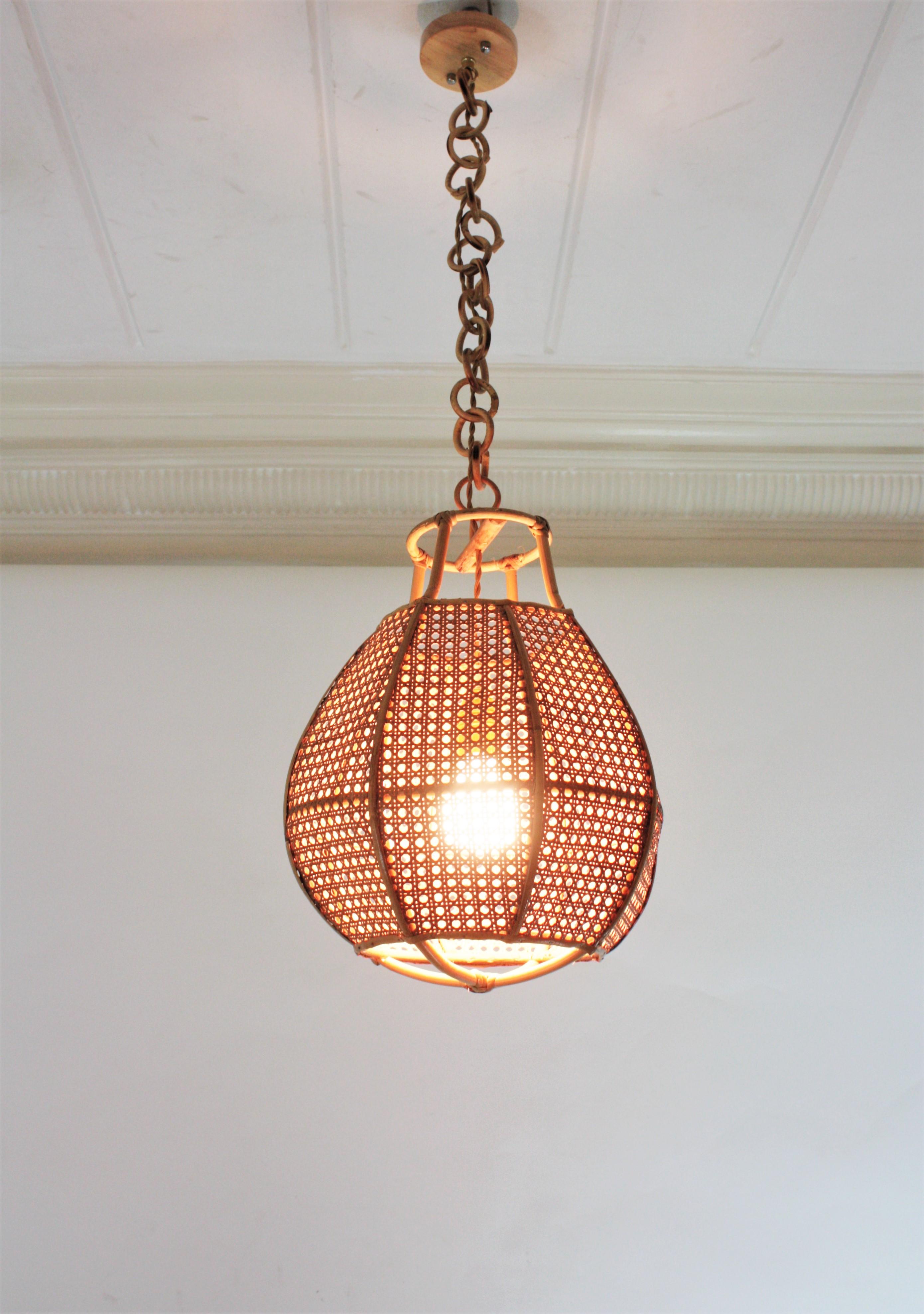 Hand-Crafted Italian Modernist Wicker Wire Rattan Globe Pendant Hanging Light For Sale