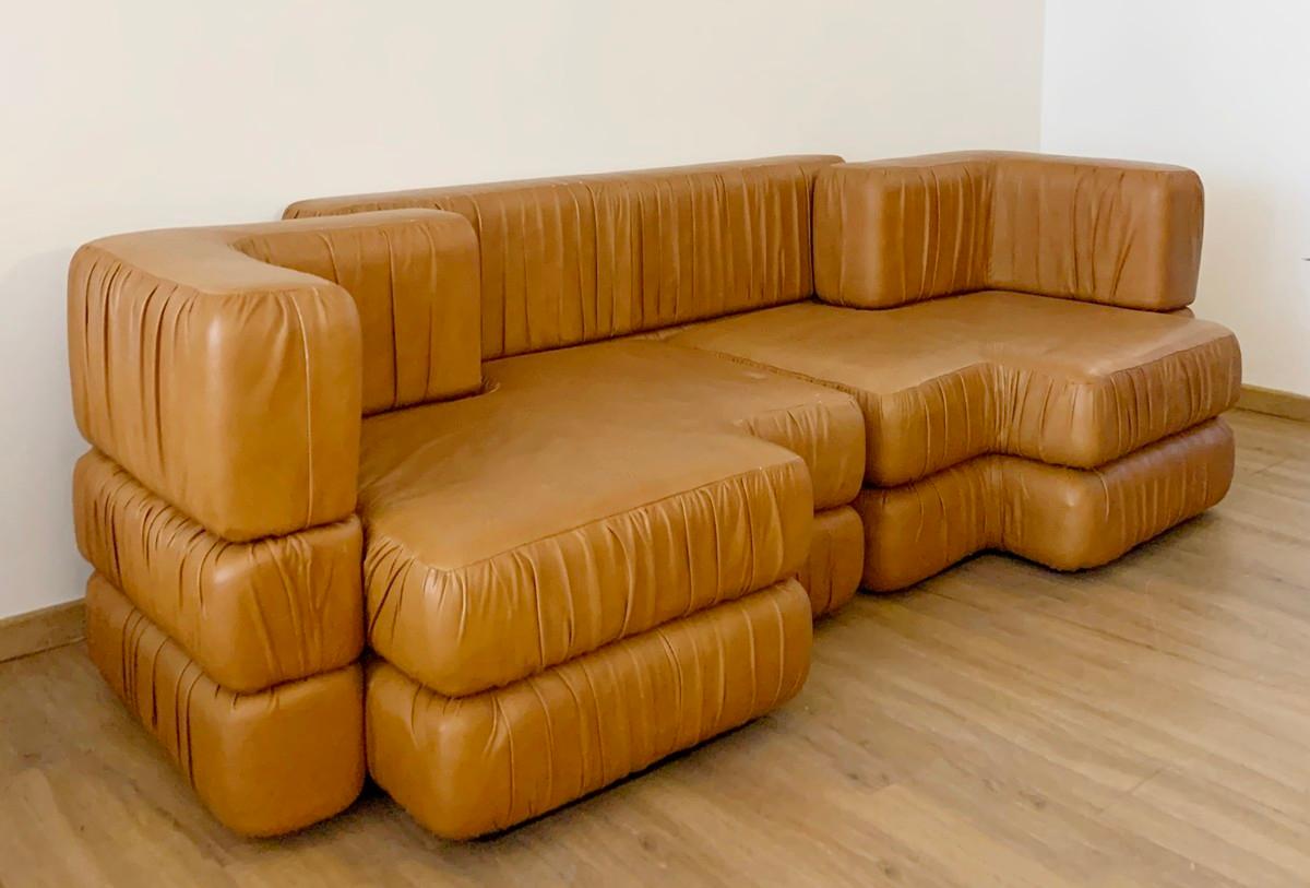 Italian modular cognac faux leather sofa.