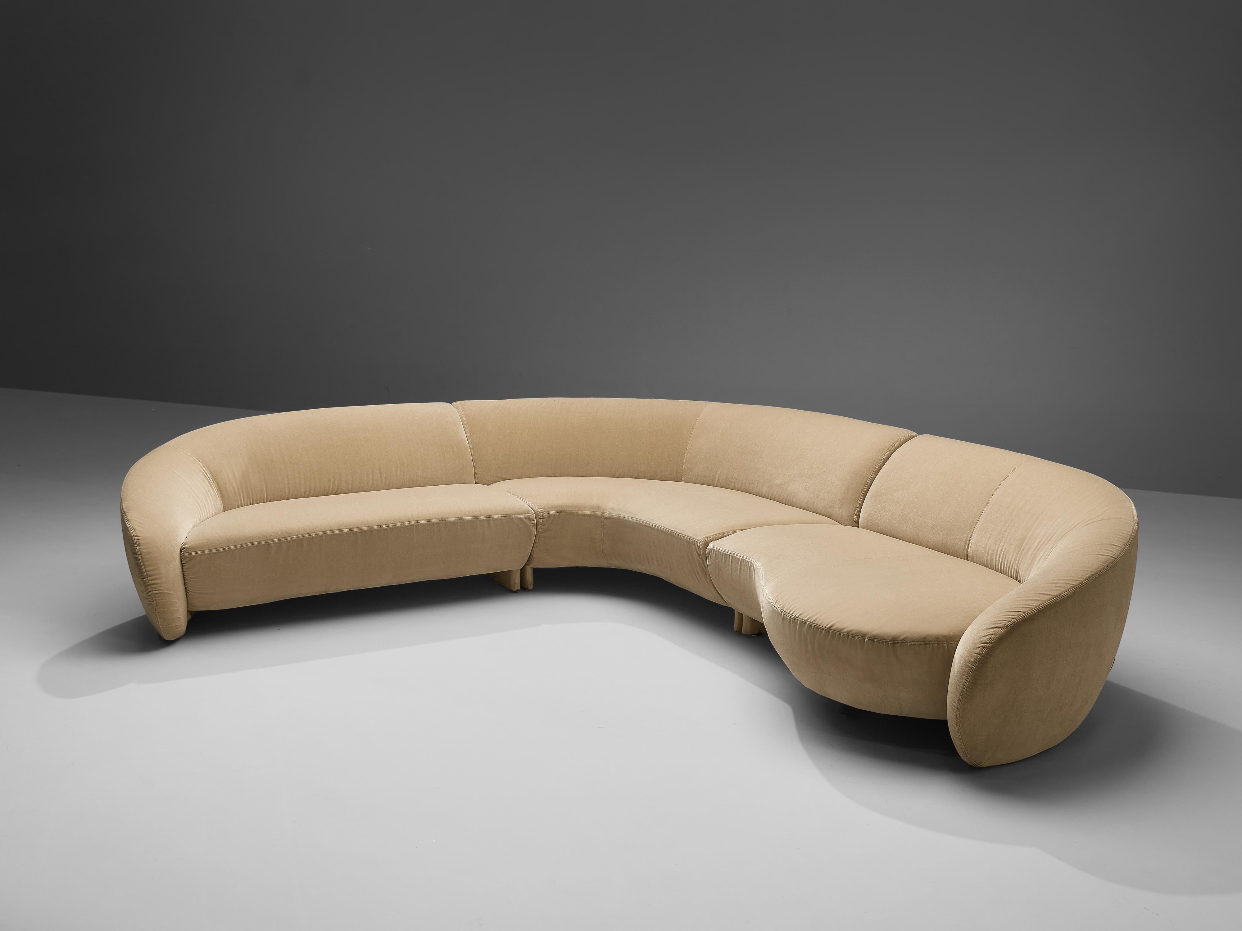 Ipe Cavalli, sectional sofa, beige velour upholstery, Italy, 1980s

Three modular pieces create this Italian corner sofa. Its rounded shape creates a rather dynamic appearance. The wide seat and round backrest that flows over into the armrests