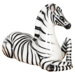 Italian Montebello Glass Statue of a Green Eyed Zebra Resting on the Ground