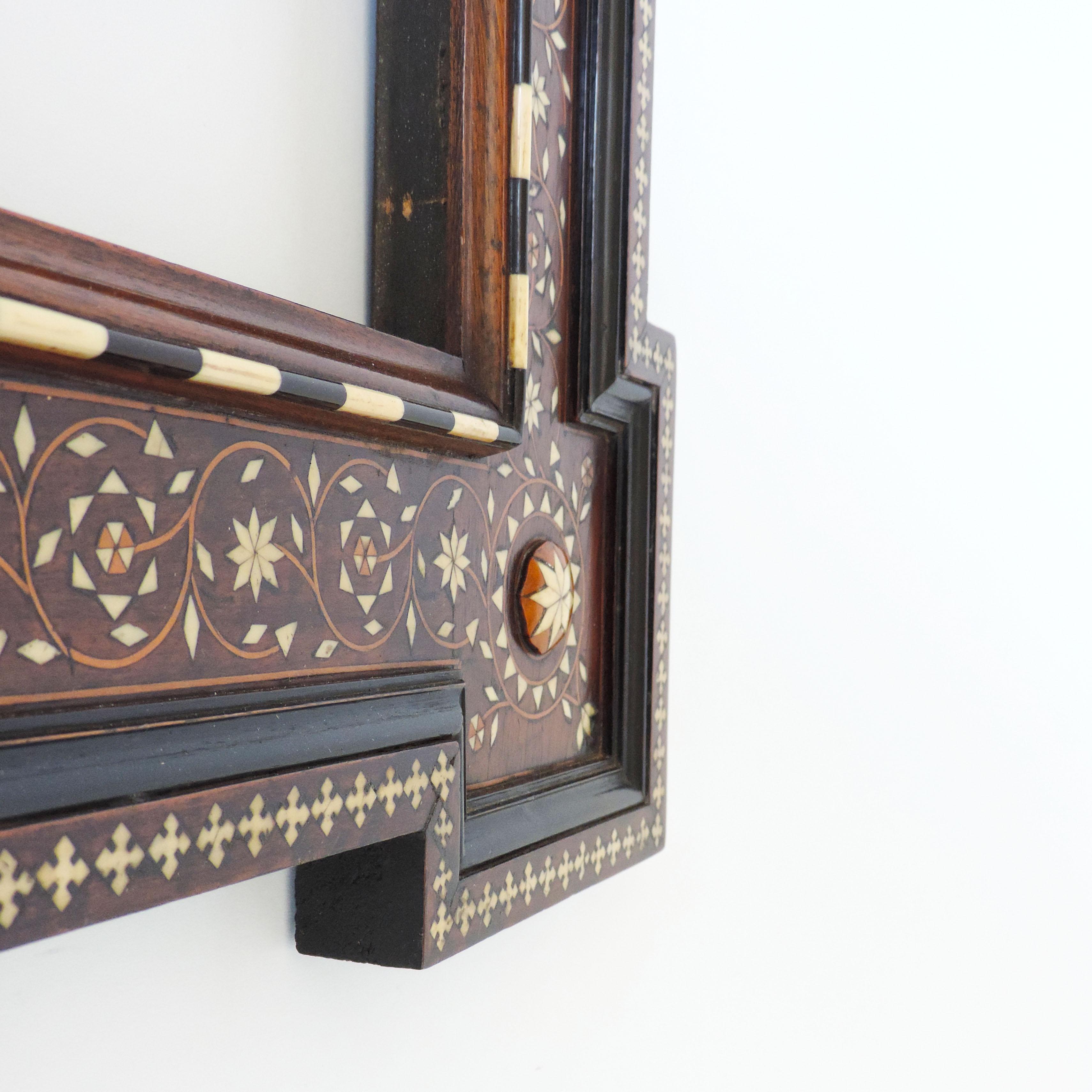A beautiful Italian Moorish bone inlay frame with saint (Inscribed Roma) for a painting or a mirror.
Very much in the Renzo Mongiardino Taste.
Inner frame size 64.5 x 51 cm.