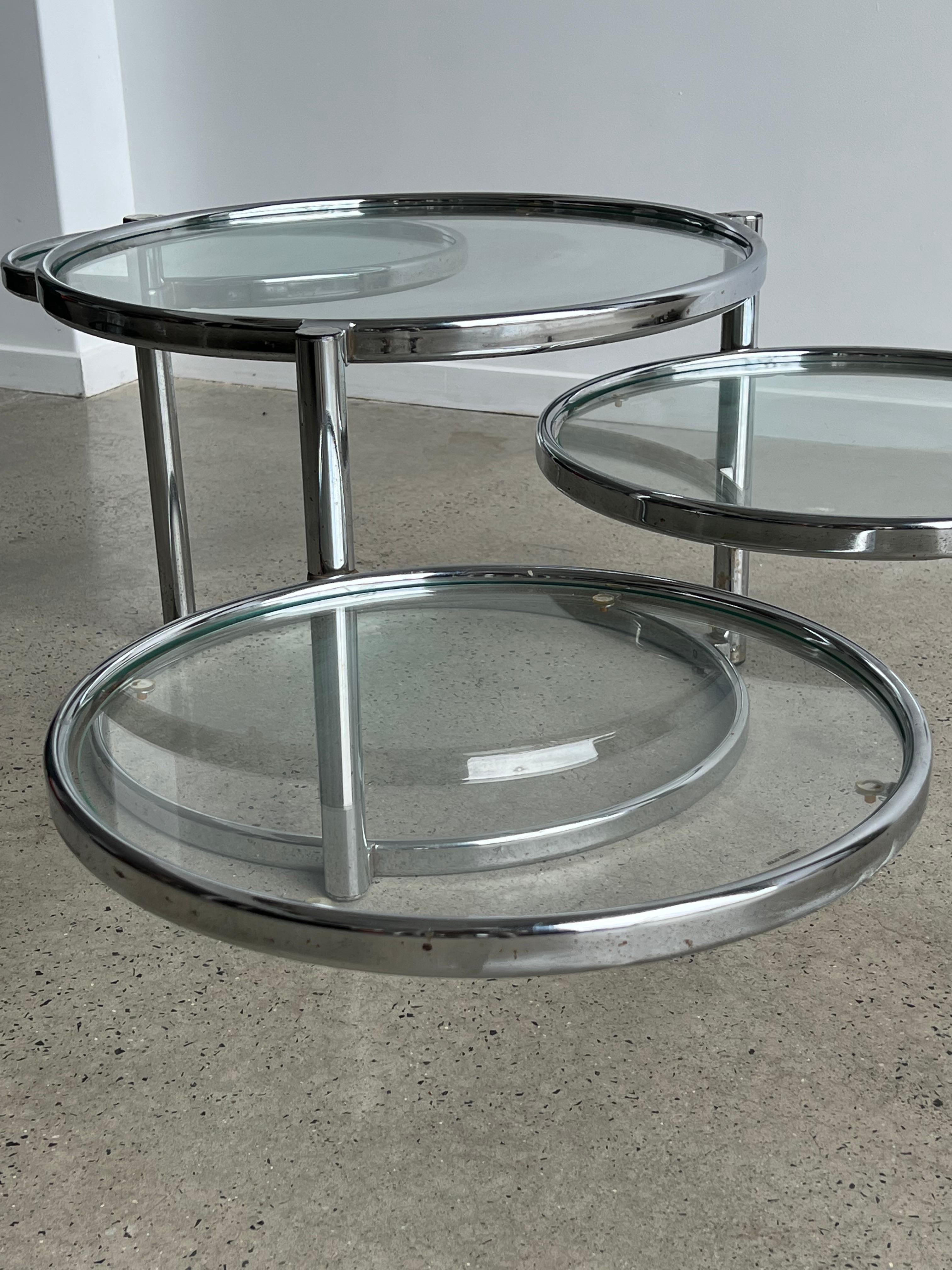 Stunning Morex 1970s convertible coffee table in glass and chrome four different glass levels.