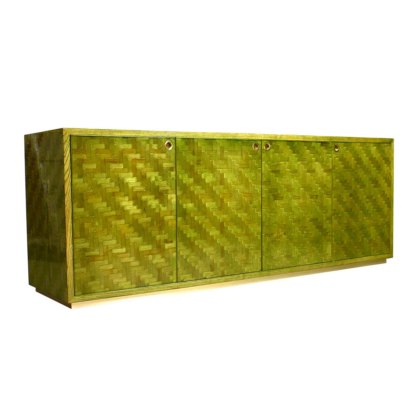 Italian credenza in stained green Palm leaf mosaic with brass details, Italy, circa 1970.

The credenza is made of stained green woven Palm leaf with brass details. The inside is also made in the same wood and color. The outside, front and back,