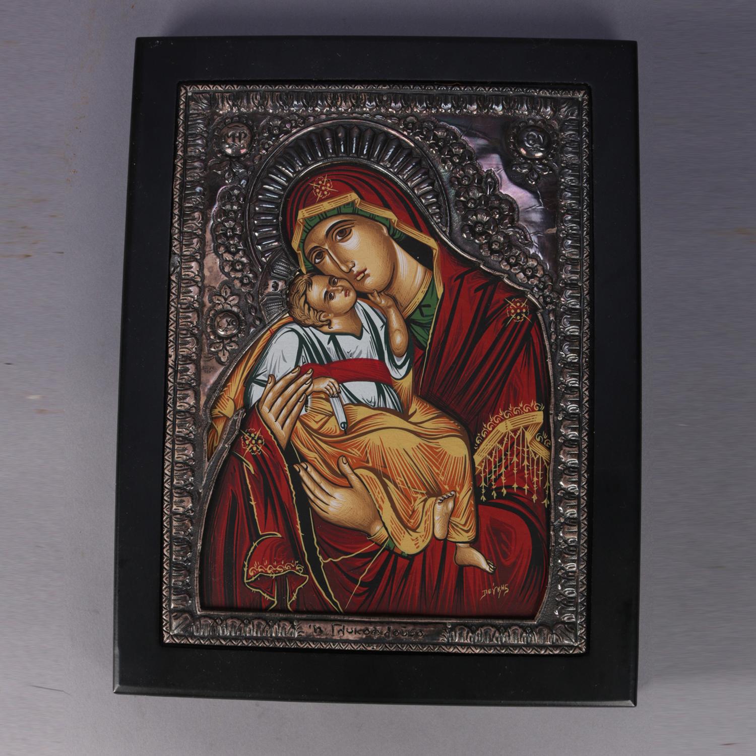 An Italian icon in embossed silver plate frame featuring Greek Orthodox Mother Mary and The Baby Jesus Christ Child, en verso certificate reads 
