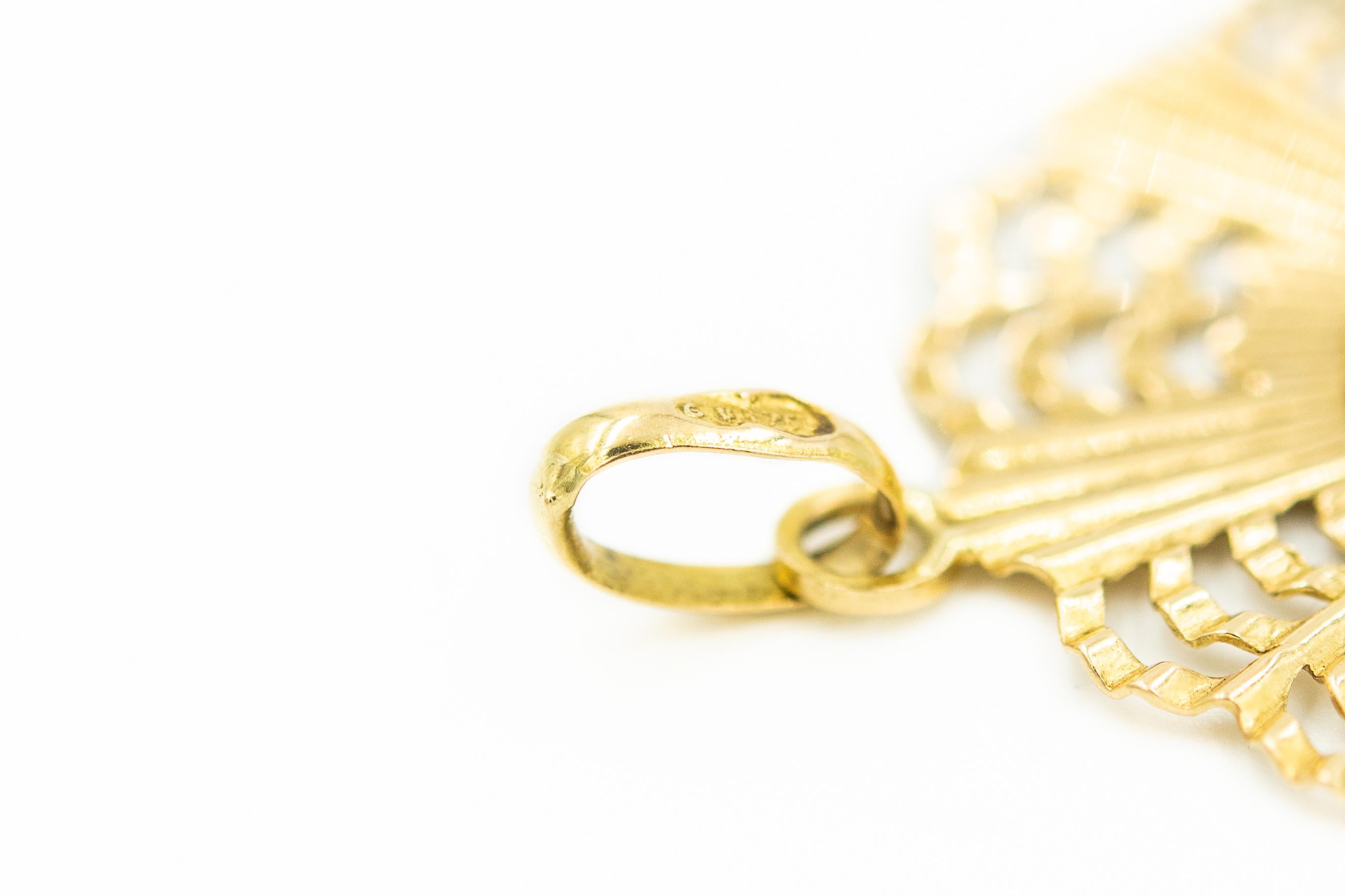 gold madonna pendant