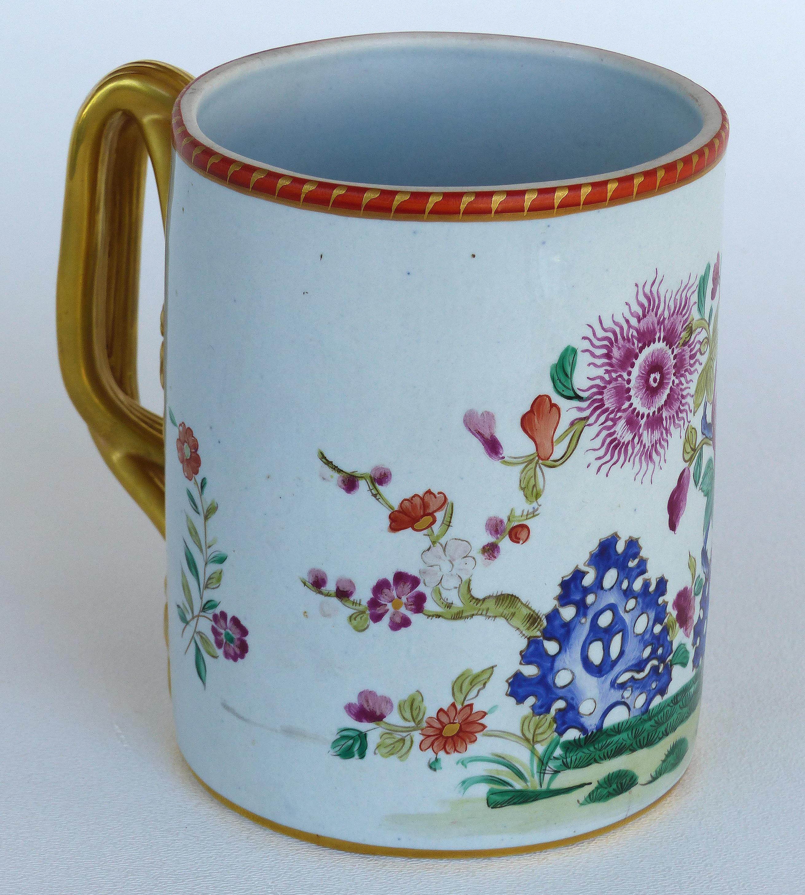 Offered for sale is an Italian Mottahedeh reproduction of an English Lowestoft fine 18th century Imperial mug with stylized gilded handle and floral decoration. Stamped on the underside.