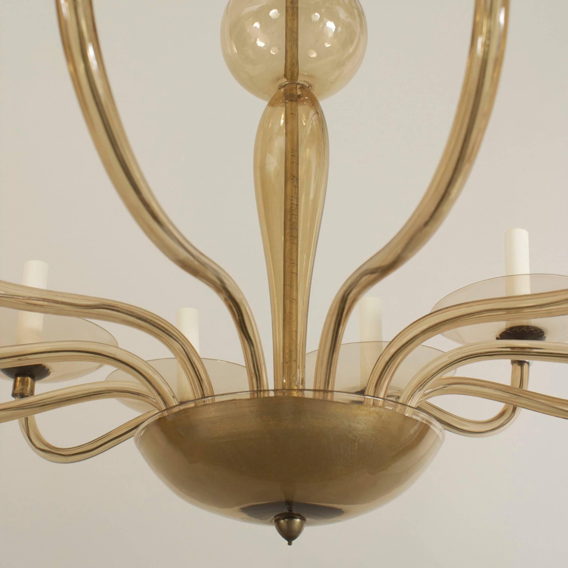 Italian Murano (1930's) smoky glass chandelier with 12 scroll form arms emanating from a shaped centerpost & holding large round disc form bobeches (att to VENINI)
