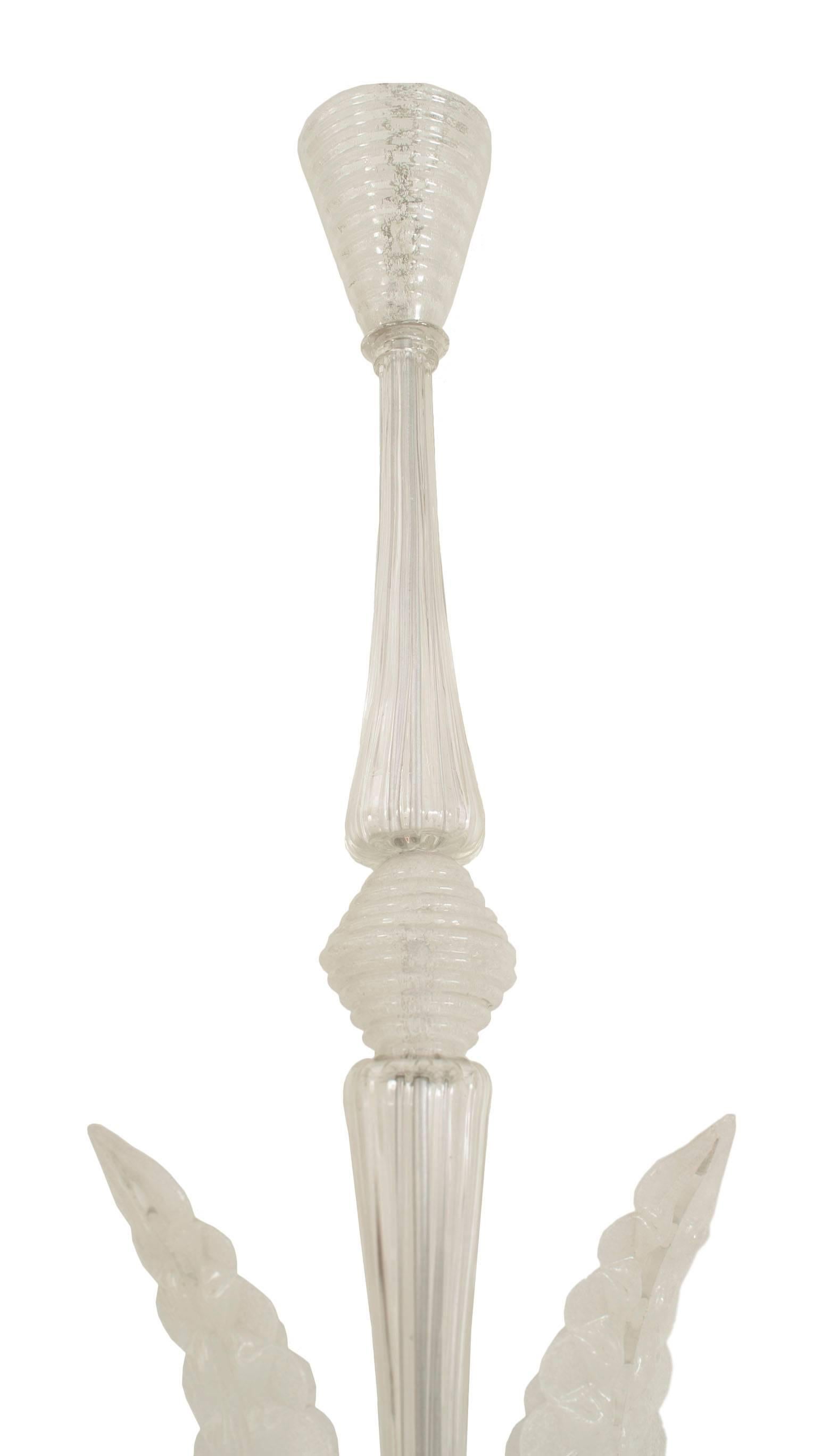 Italian Murano 1940s chandelier with 4 feathers and scroll arms supporting full form shades with applied glass trim emanating from a tiered bowl with a finial bottom (by BAROVIER ET TOSO)

