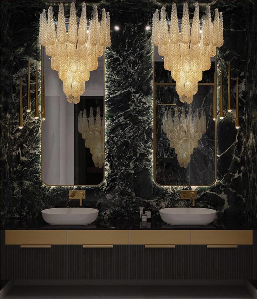 Pair of huge Italian vintage Murano chandeliers made by 75 glass petals (transparent crystal, smooth outside, with crystal powder and then rough inside in a chrome frame,
period 1970s-1980s.

Dimensions: 65 inches (165 cm) height with chain; 37.40