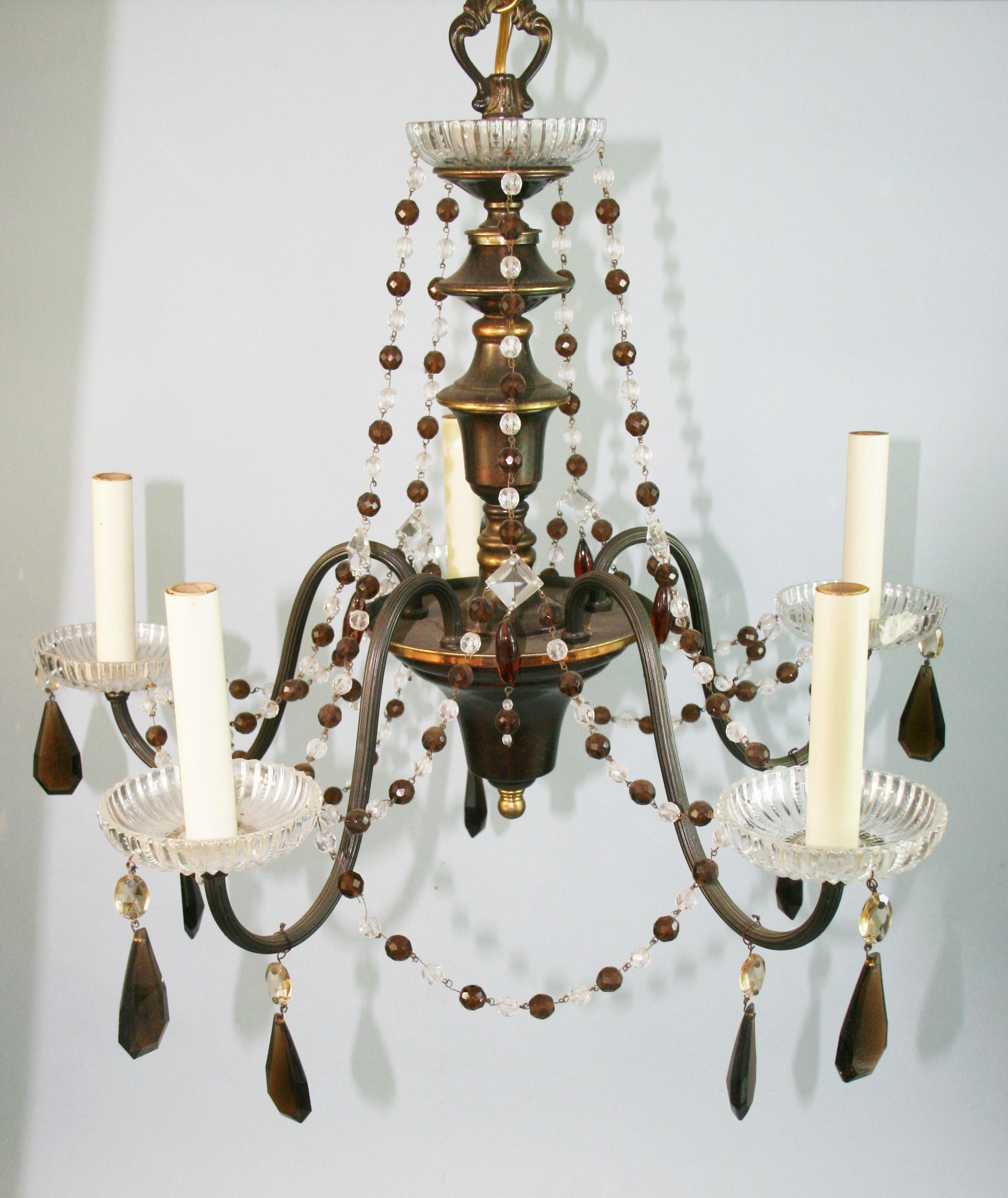 1618 Reeded arm five-light chandelier dressed with amber and crystal beads
Takes 40 watt candelabra based bulbs.
 