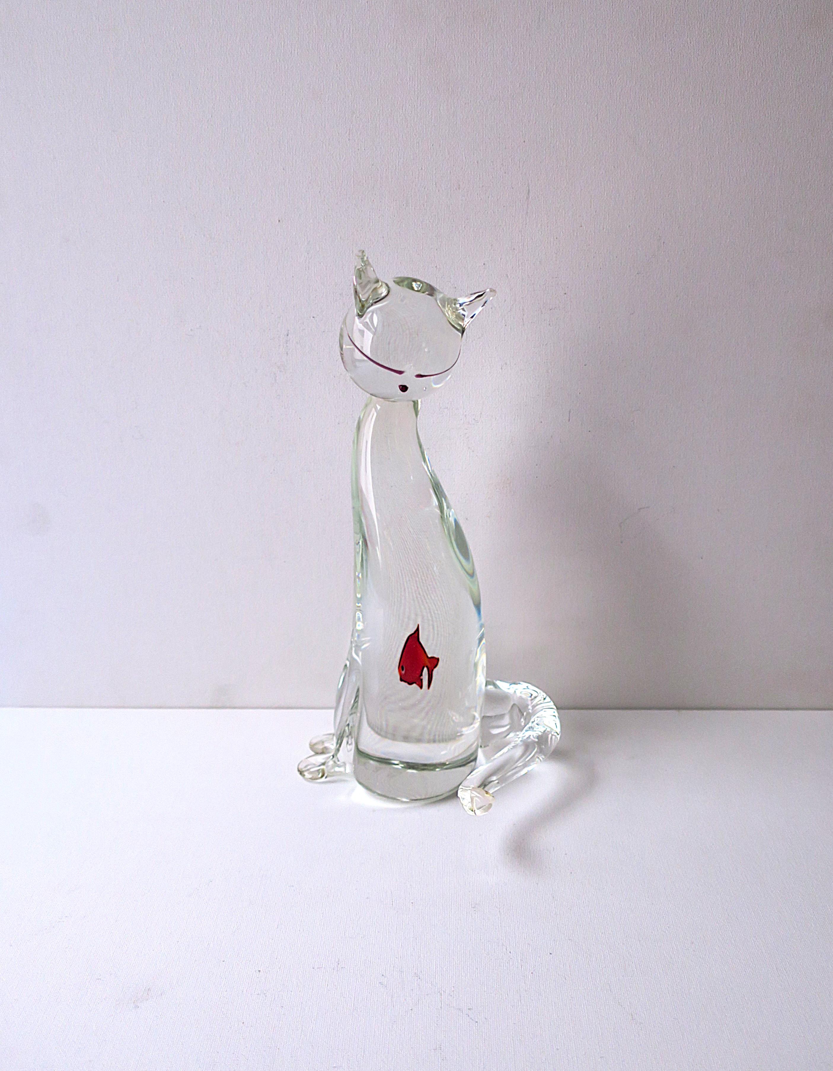 A beautiful and substantial Italian Murano art glass cat and goldfish sculpture, numbered/limited edition, in the Modern style, circa mid-20th century, Italy. A beautiful hand-blown transparent/clear Italian Murano art glass cat sculpture with