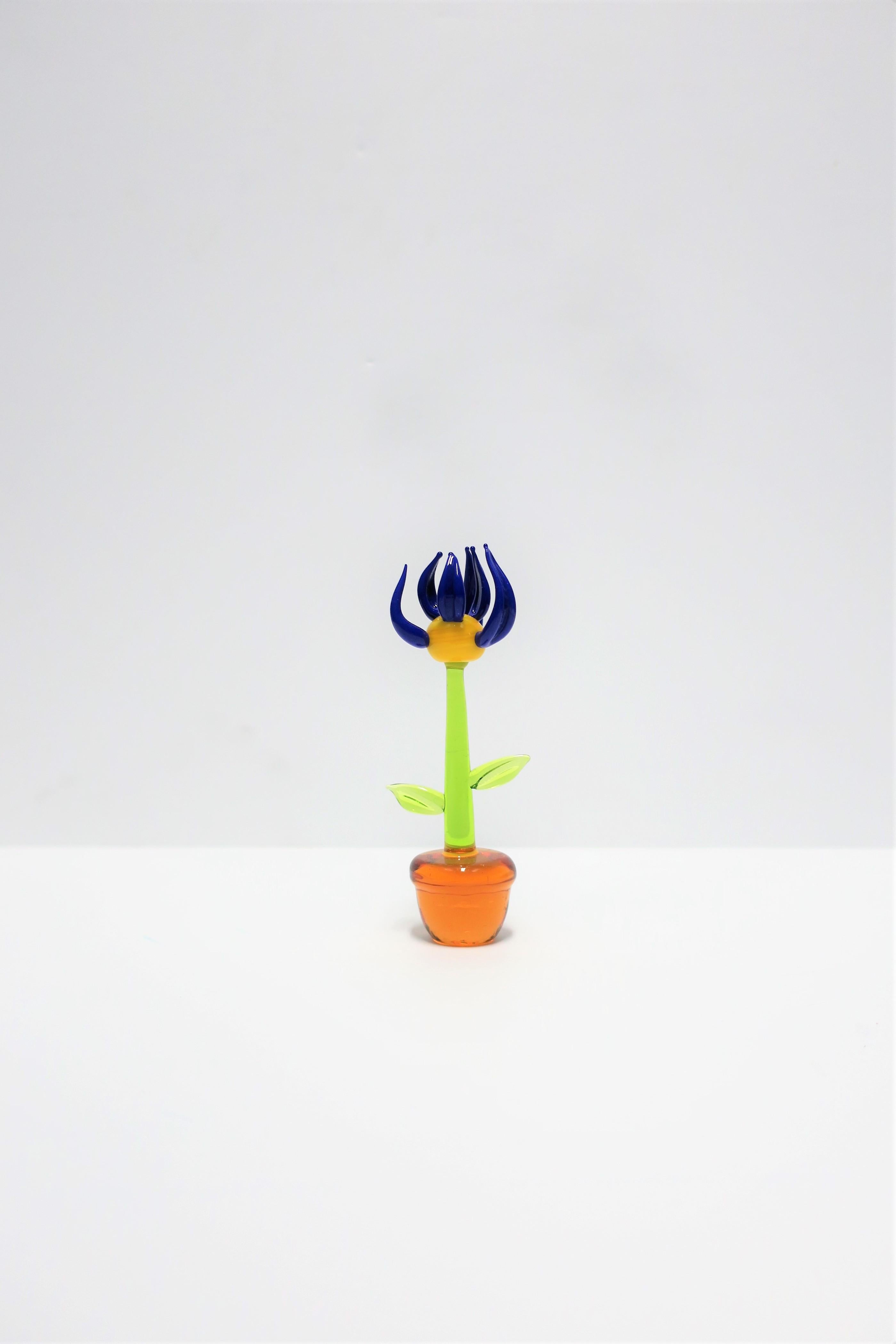 A beautiful small contemporary Italian murano art glass sunflower flower sculpture, circa late 20th century, Italy. With designer maker's mark on bottom (image #11.) Colors include: orange, green, yellow and cobalt blue.

Piece measures: 1.25