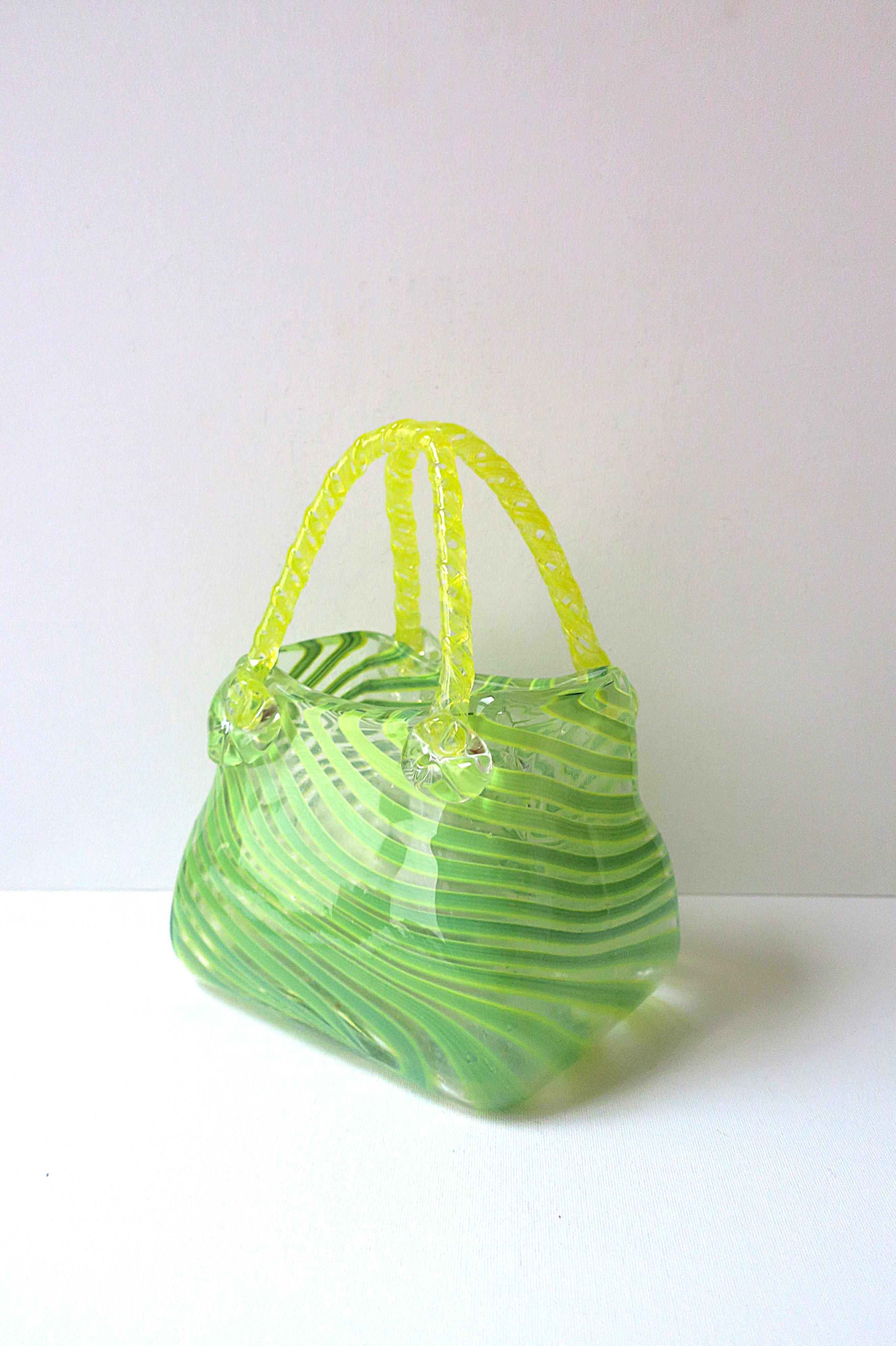 A beautiful and rare Italian Murano art glass handbag purse vase in chartreuse green and bright yellow, circa late-20th century, Italy. This Italian Murano art glass handbag purse has a chartreuse green ribbon design, bright yellow 'twisted ribbon'