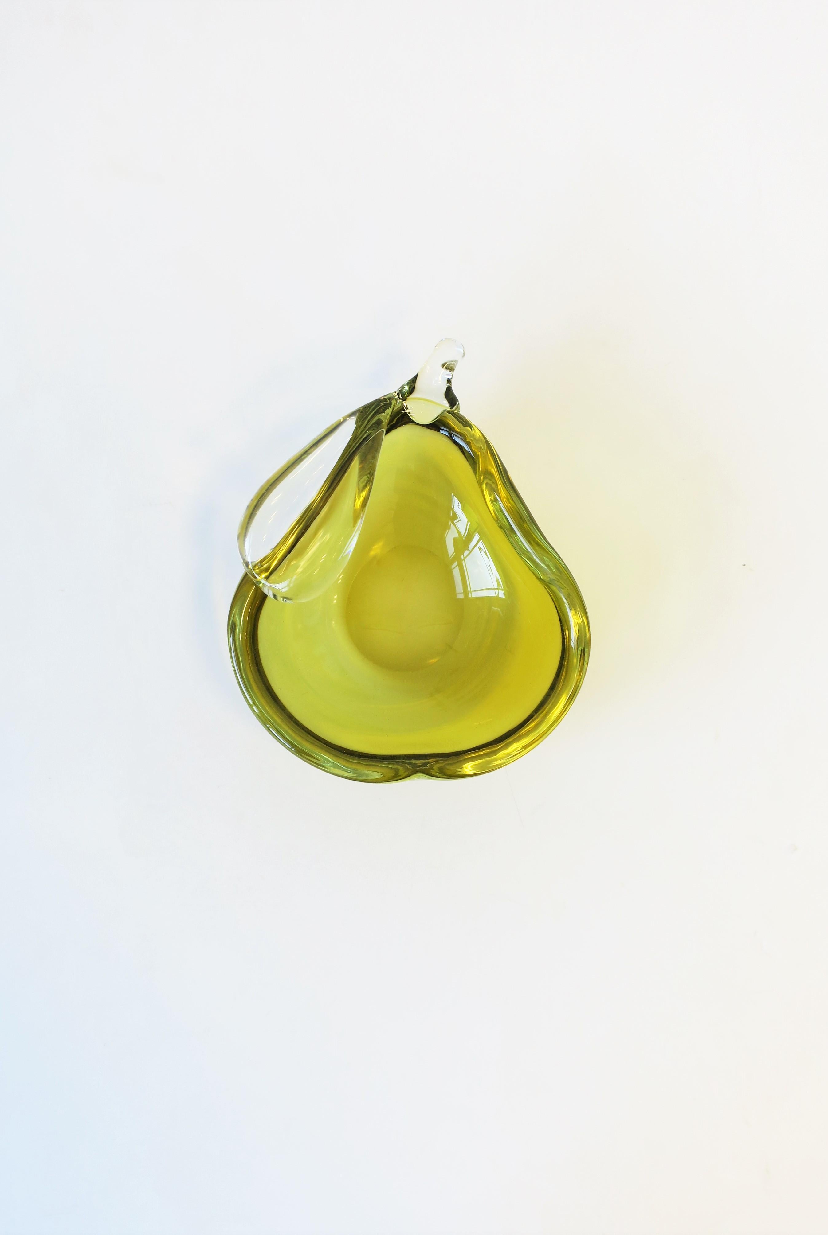 A very beautiful Italian Murano pear fruit yellow art glass bowl, Italy. A great standalone piece. Equally nice as a candy dish, catchall/vide-poche (as demonstrated in images #9 and 10), etc. Dimensions: 2.5