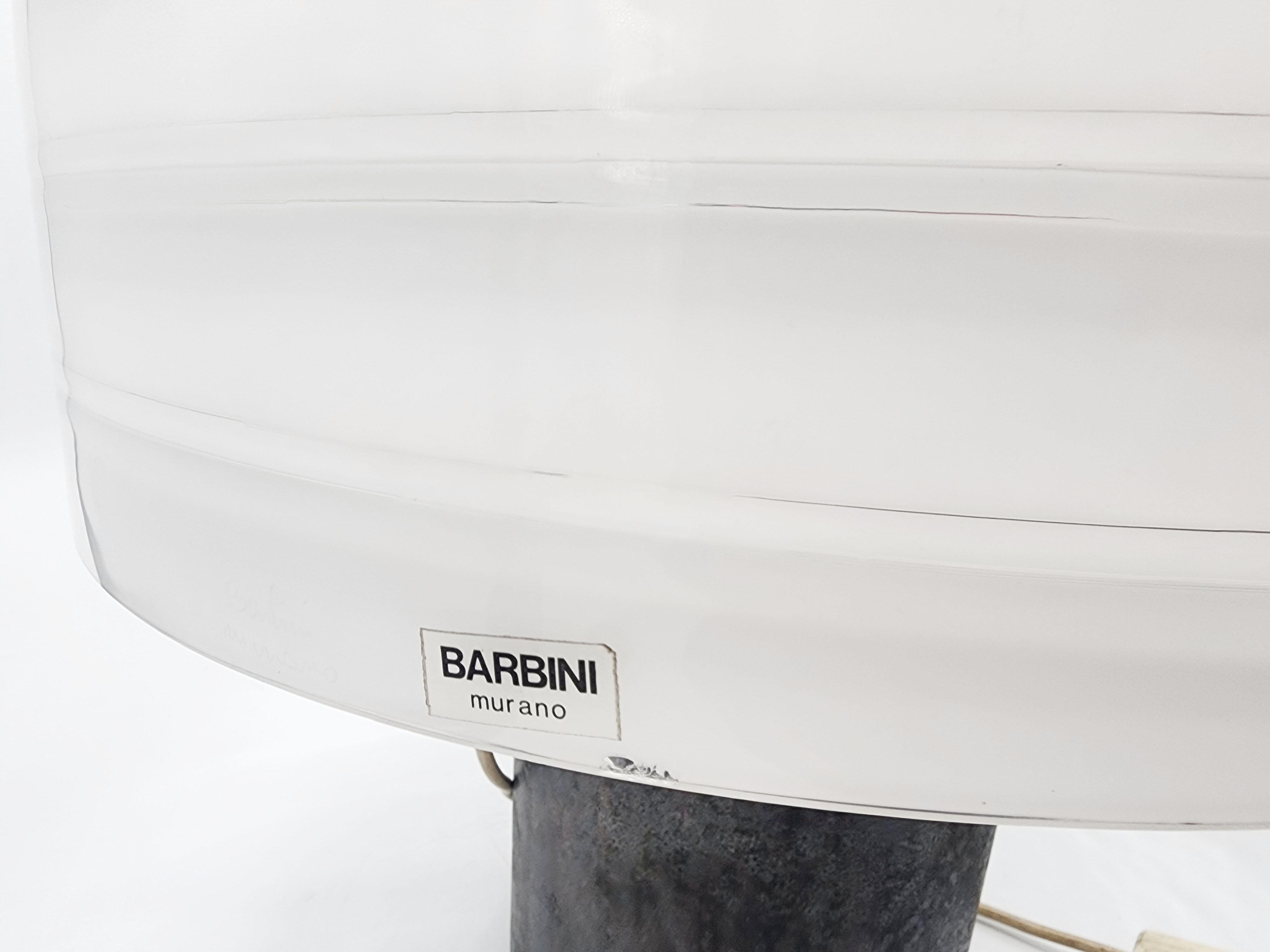 Italian Murano Barbini Lamp
Beautiful Murano glass lamp by the famous designer Alfredo Barbini, from the 1950s. In the shape of a mushroom, characteristic of the space age, giving it personality and making it stand out.It has a small chip due to its