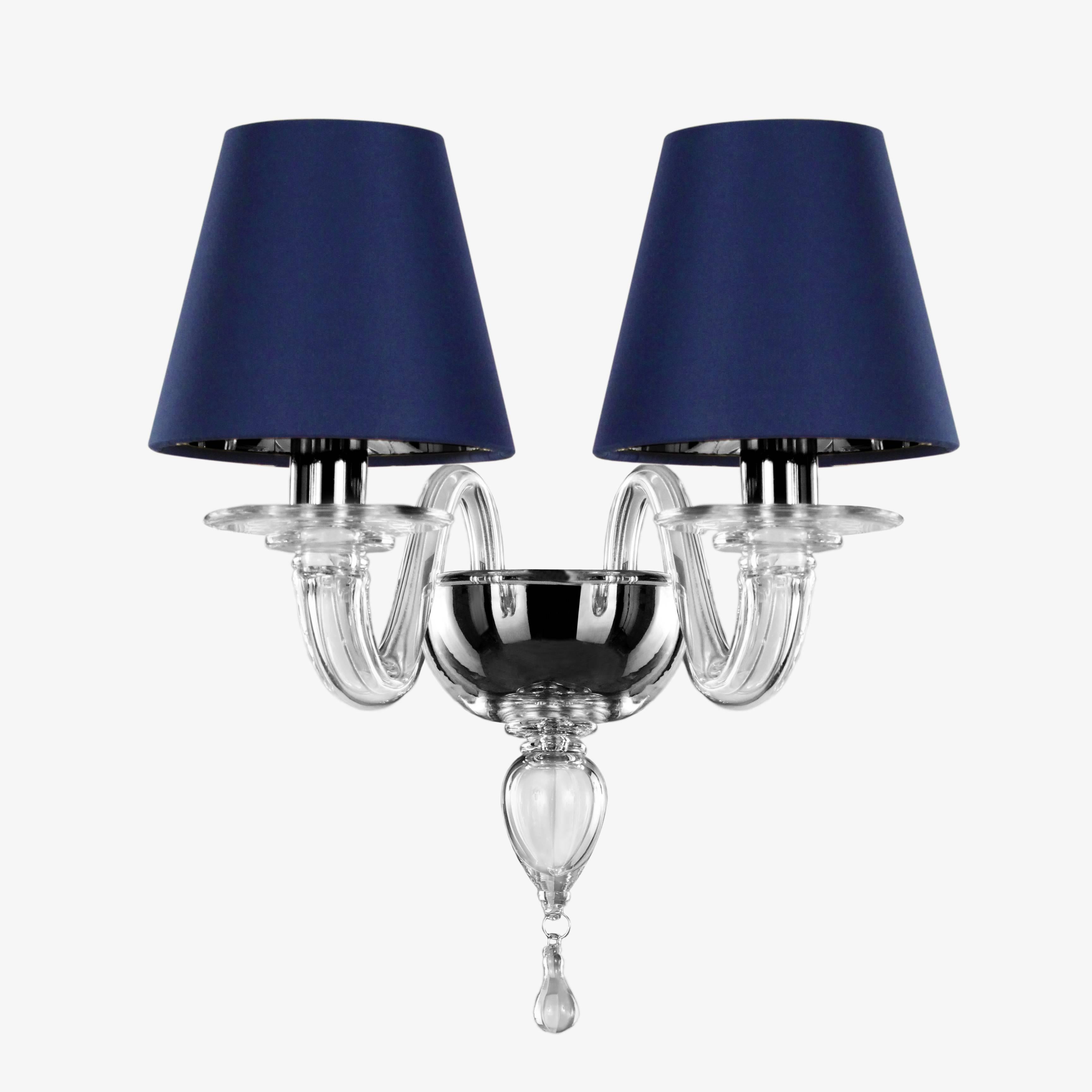Twice-arms Venetian wall chandelier, handcrafted by Murano Glass Master belong tradition of blown glass Art
Color pure transparent and blue shade.
Silver frame finish.
Matching chandelier, table lamp, floor lamp available.

We can wire it for