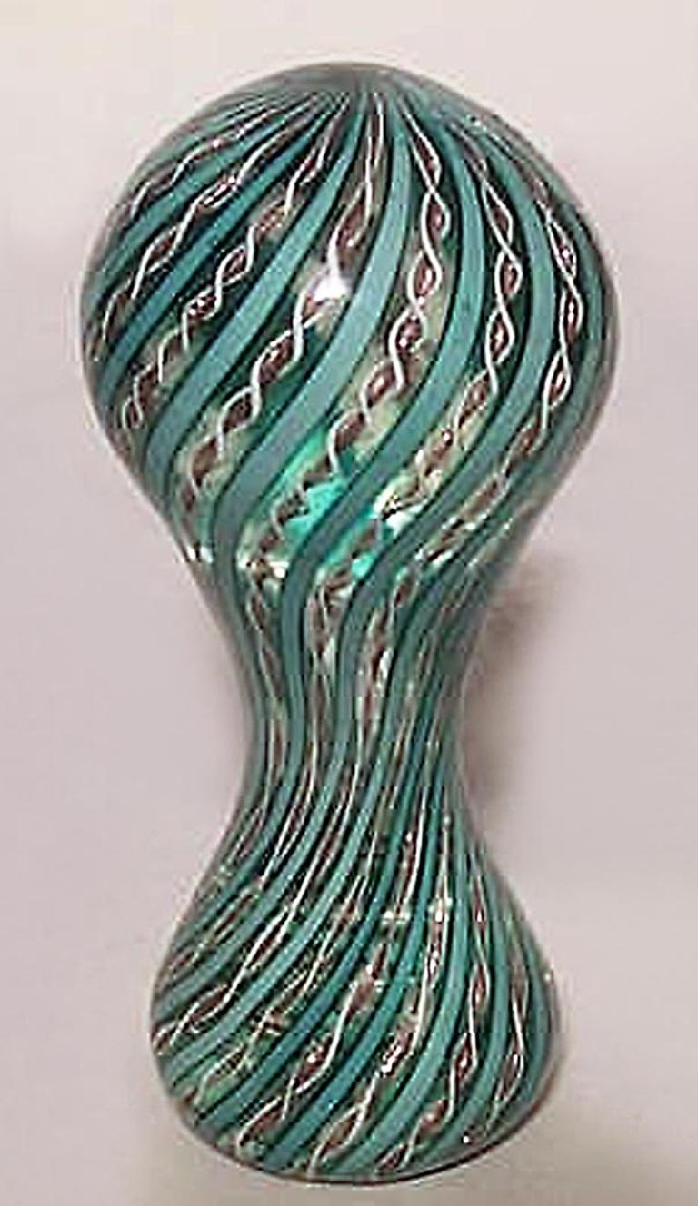 Italian Venetian Murano-style (Mid-20th Century) crystal bulbous shaped paperweight with blue and white swirl design.