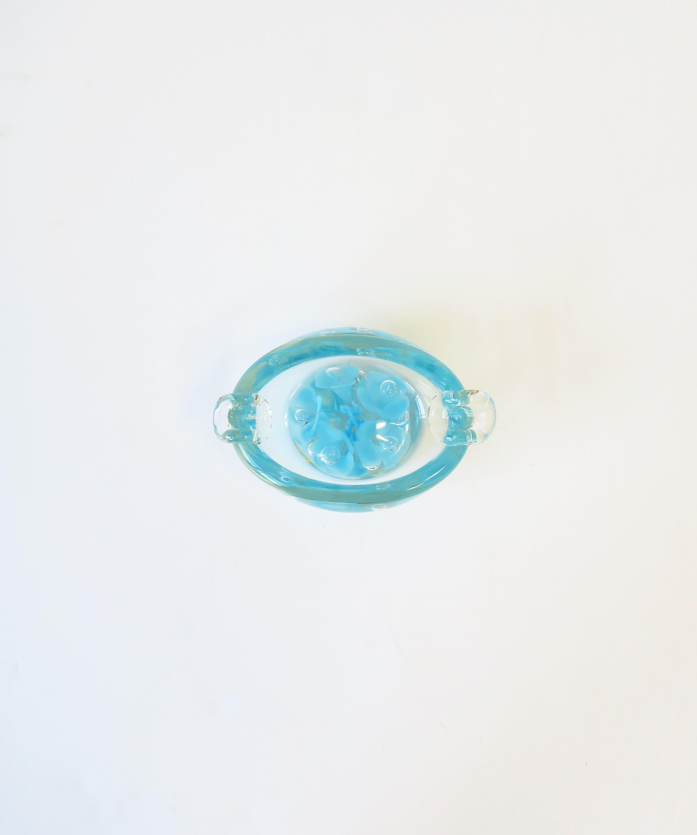 A small and substantial Italian Murano sky blue art glass ashtray or bowl, circa late-20th century, Italy. Great as its intended use (ashtray), as a standalone piece, or to hold small items such as jewelry on a desk, vanity, nightstand, dresser,