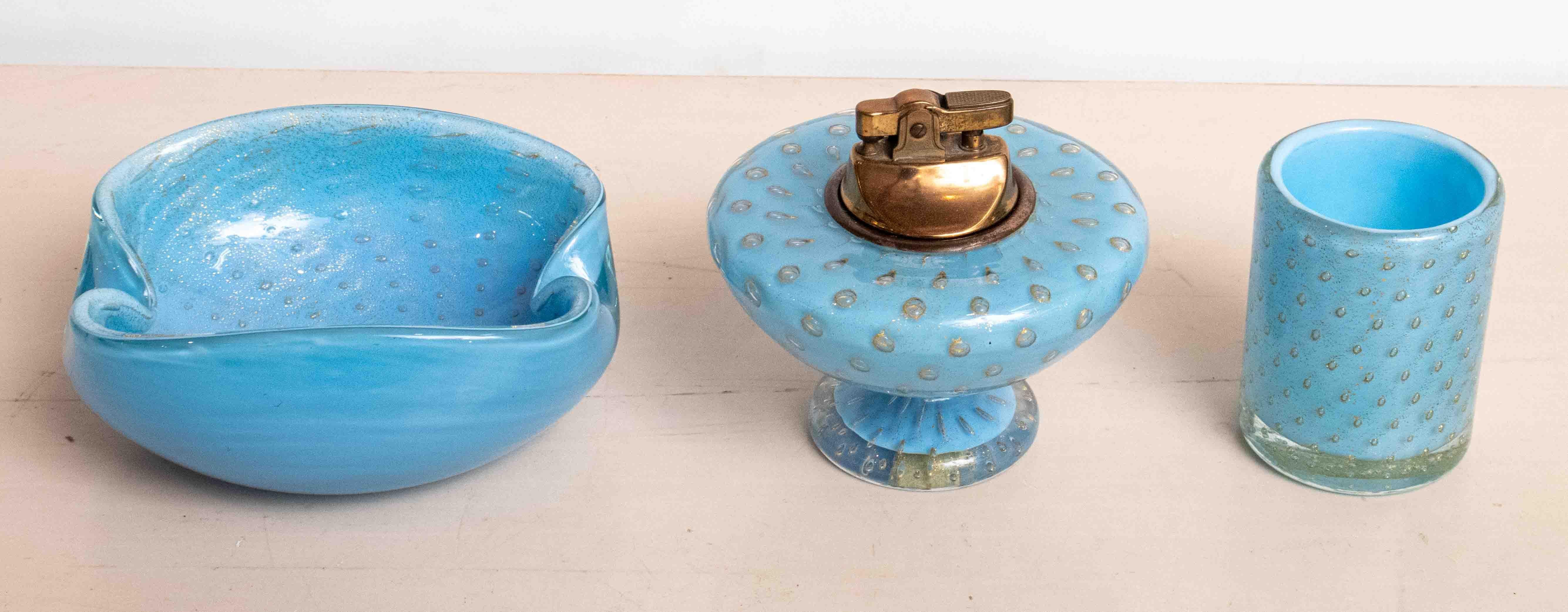 1950's Italian Murano Glass Smoking Set. Set included a glass to store matchsticks, a lighter, and a bowl for cigars/cigarettes. Blown bubble glass attributed to Barovier and Toso. Measurements: Glass 2