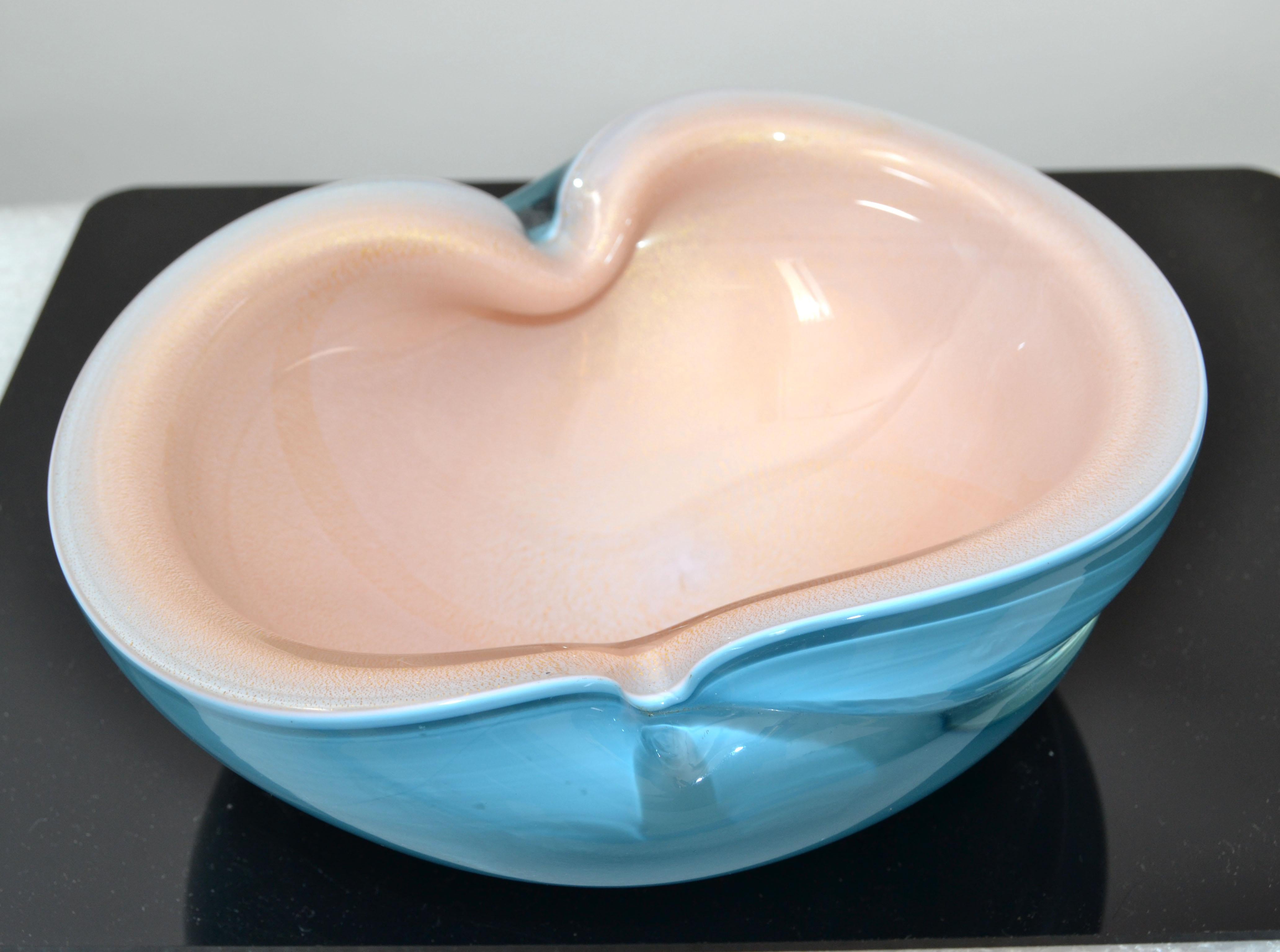 1960 Murano blown art glass bowl in turquoise blue, Gold dusted peach & Clear glass made in Italy.
Mid-Century Modern triple cased unique glass art very elegant and practical.