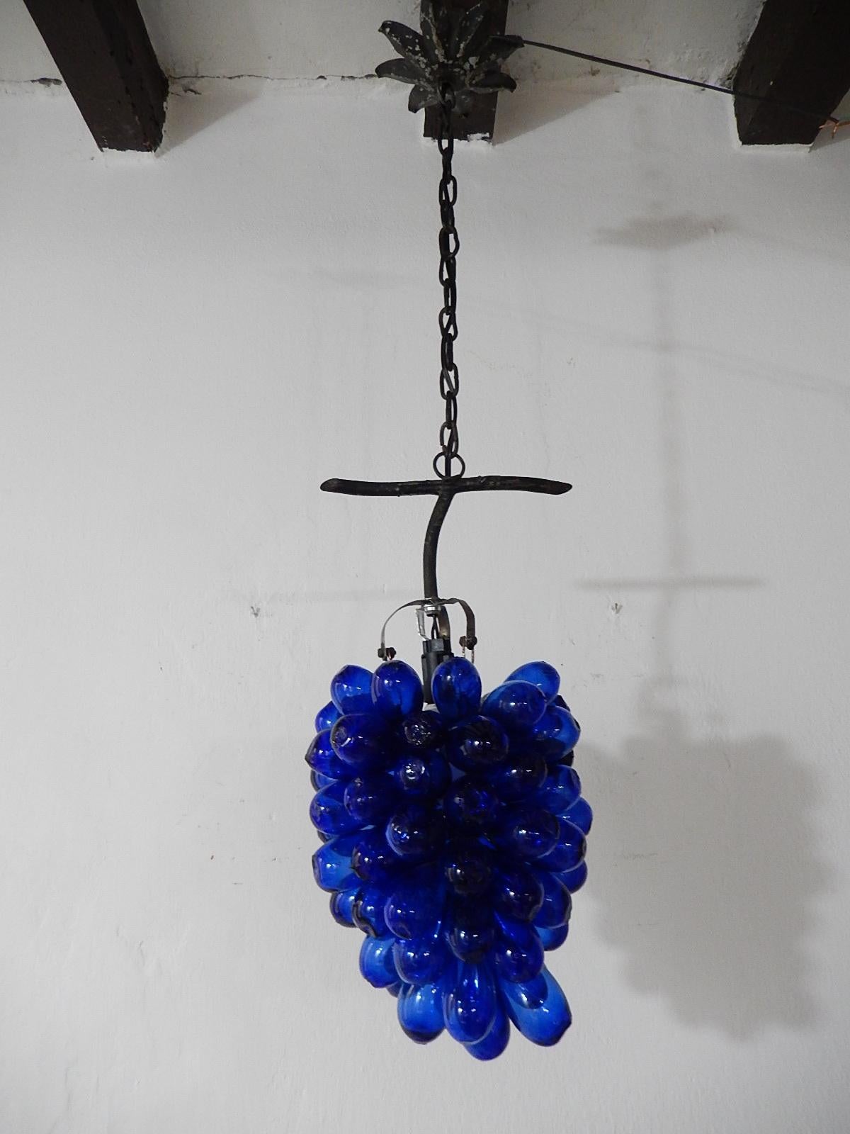 Housing one-light. Rewired and ready to hang. Rare big mouth blown cobalt Murano glass grape cluster drops. Adding another 14 inches of original chain and canopy. Free priority UPS shipping from Italy, no custom fees.