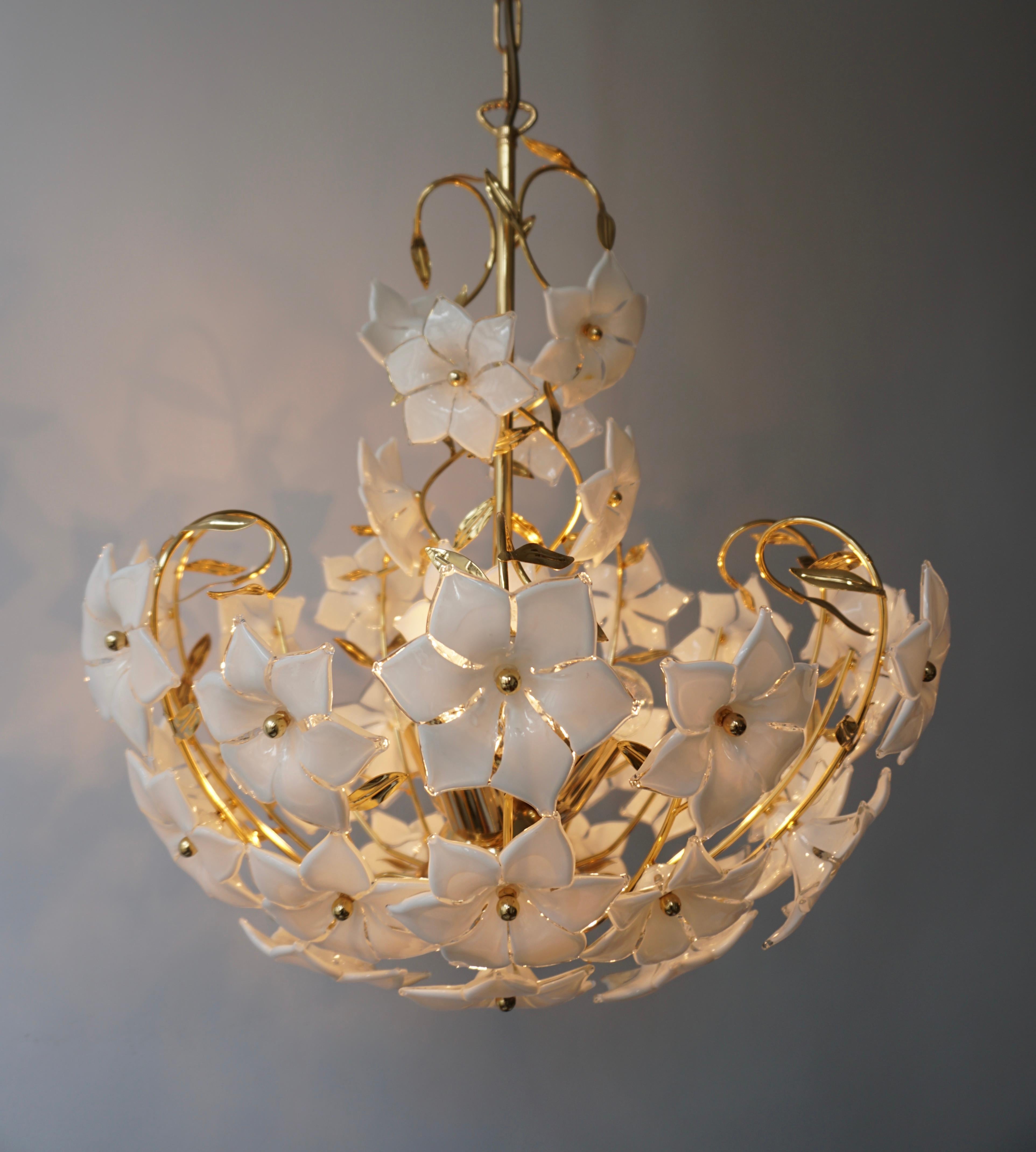 Three 1970s Italian Murano glass flower bouquet chandeliers with hand-blow white and clear glass flowers and gold-plated brass.

The lamp has three sockets for small incandescent lamps with screw base or E14 type LEDs. It is possible to install this