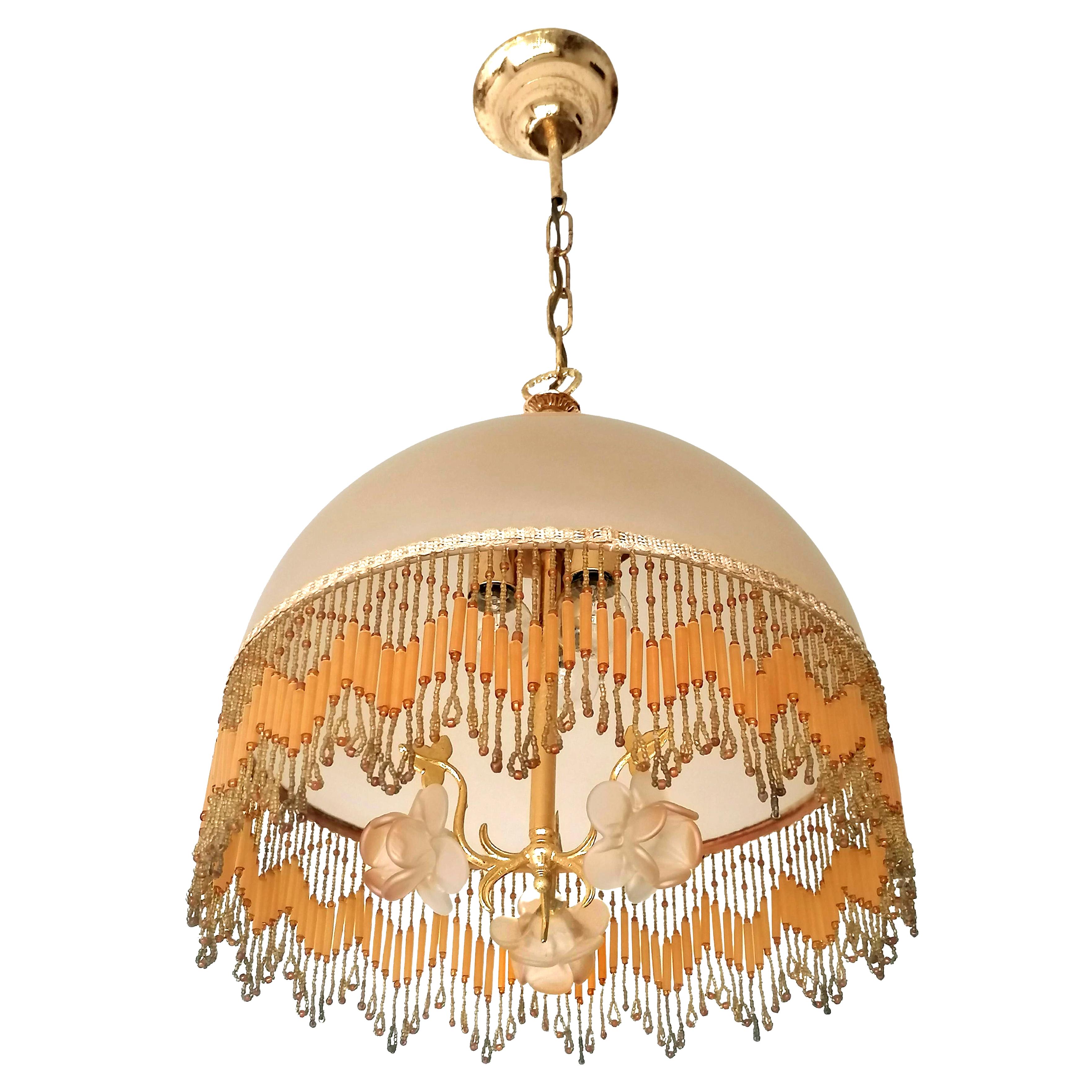 Beautiful Italian midcentury chandelier with Amber Glass Flowers & Beaded Glass Fringe in the style of Art Deco and Art Nouveau.
Dimentions:
Height 26.35 in. (chain/6 in)/ 72 cm (chain/15 cm)
Diameter 14.18 in. (36 cm)   
3-light bulbs E14/ good
